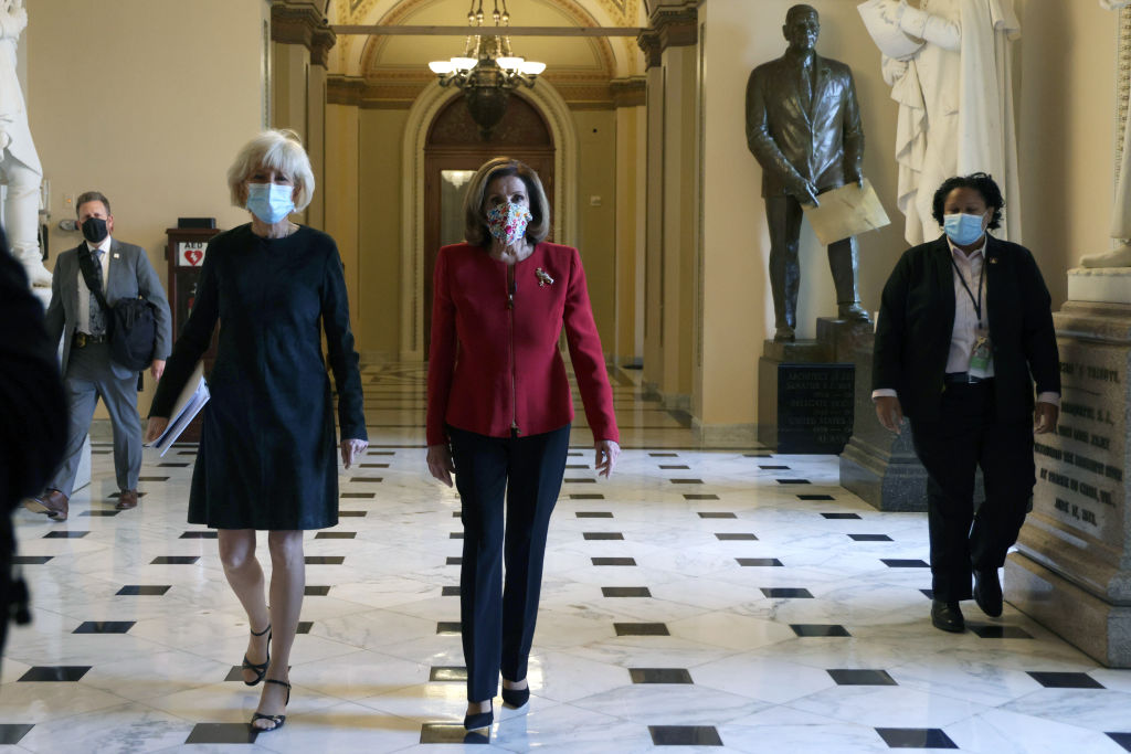 U.S. Speaker Rep. Nancy Pelosi (D-Calif.) walks with '60 Minutes' correspondent Lesley Stahl of CBS News in a hallway at the U.S. Capitol January 8, 2021 in Washington, D.C. Speaker Pelosi and her leadership team are considering an impeachment process of President Donald Trump after pro-Trump mobs stormed the Capitol and temporarily stopped the process the certification for President-elect Joe Biden and Vice President-elect Kamala Harris’ electoral college win.