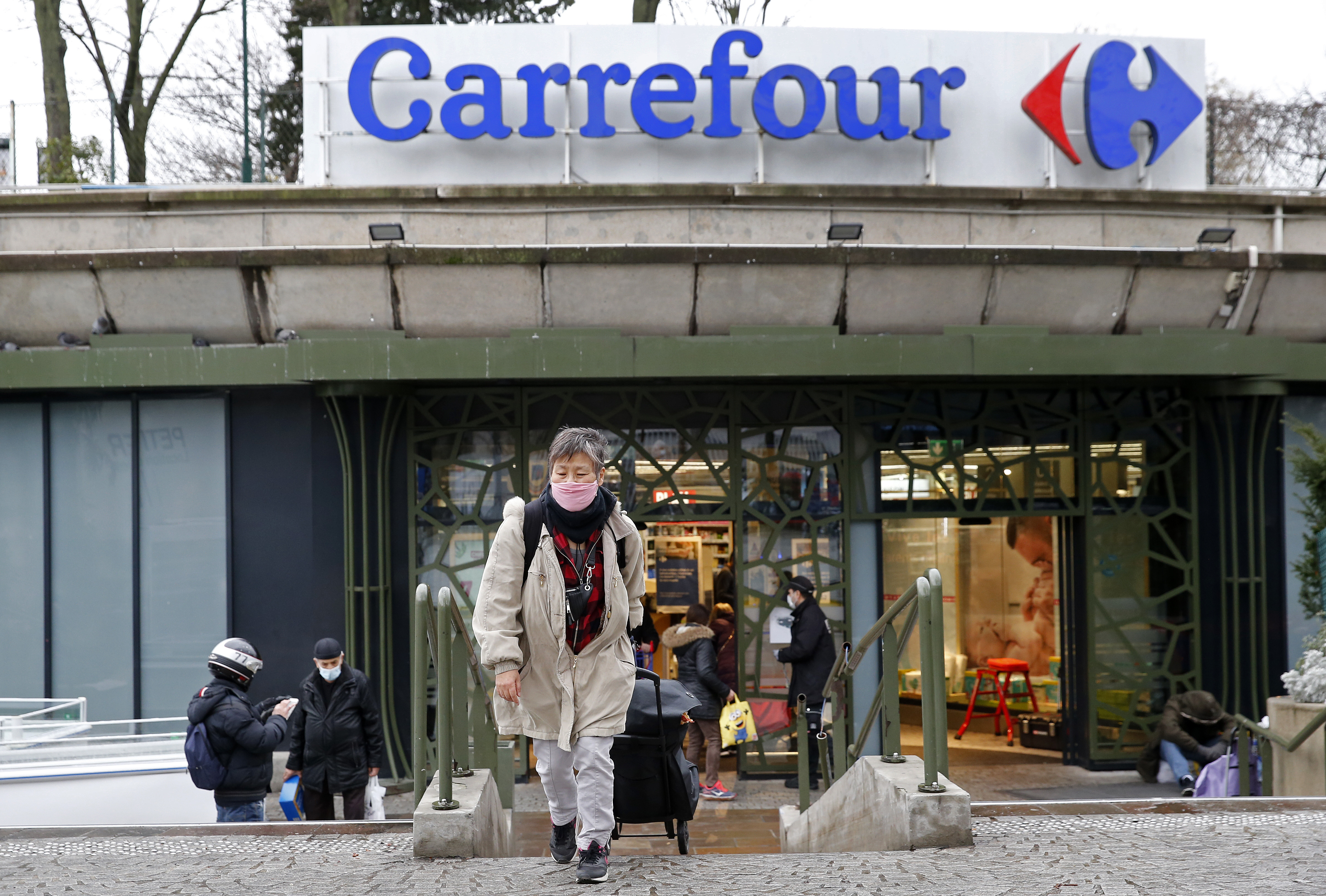 France’s iconic retail giant Carrefour is the target of takeover talks, a development that’s unsettling French politicians.