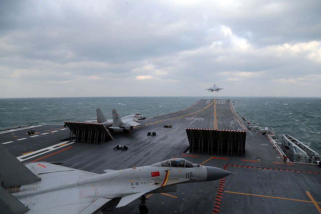 Chinese J-15 fighter jets are launched from the deck of the Liaoning aircraft carrier during military drills in the Yellow Sea, off China's east coast, on December 23, 2016.