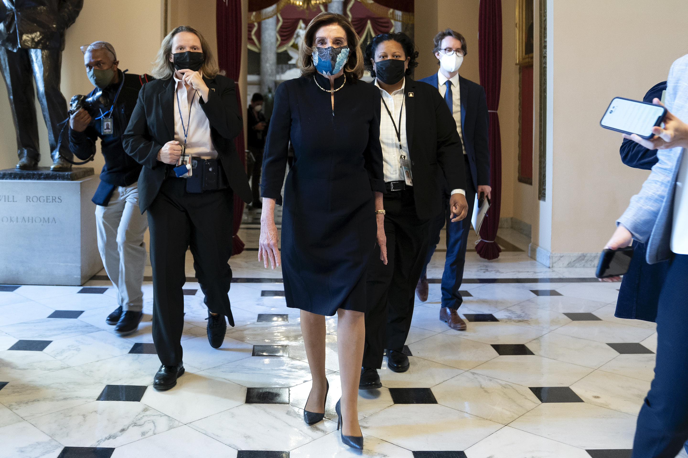 Nancy Pelosi heads to the House Floor on Jan. 13, where the House was set to vote to impeach President Donald Trump. Vice President Mike Pence declined to use the 25th amendment to remove him from office after protestors breached the U.S. Capitol last week.