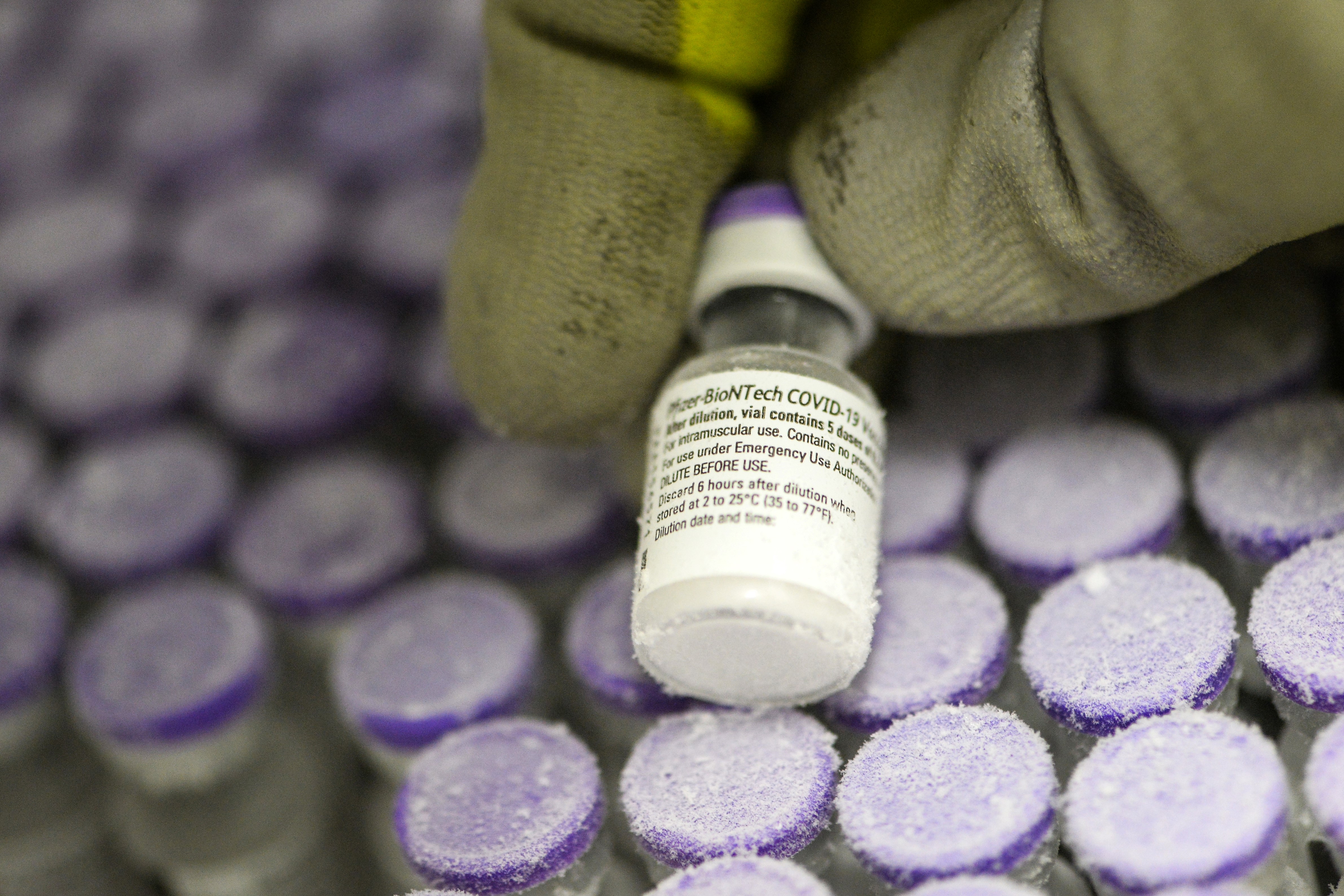 A vial of the Pfizer/BioNTech vaccine, stored at –70°C in a freezer at a hospital in Le Mans, France, on Jan. 15, 2021. Strict cold-storage requirements have proved an obstacle to distribution, but new data shows this may not be necessary.