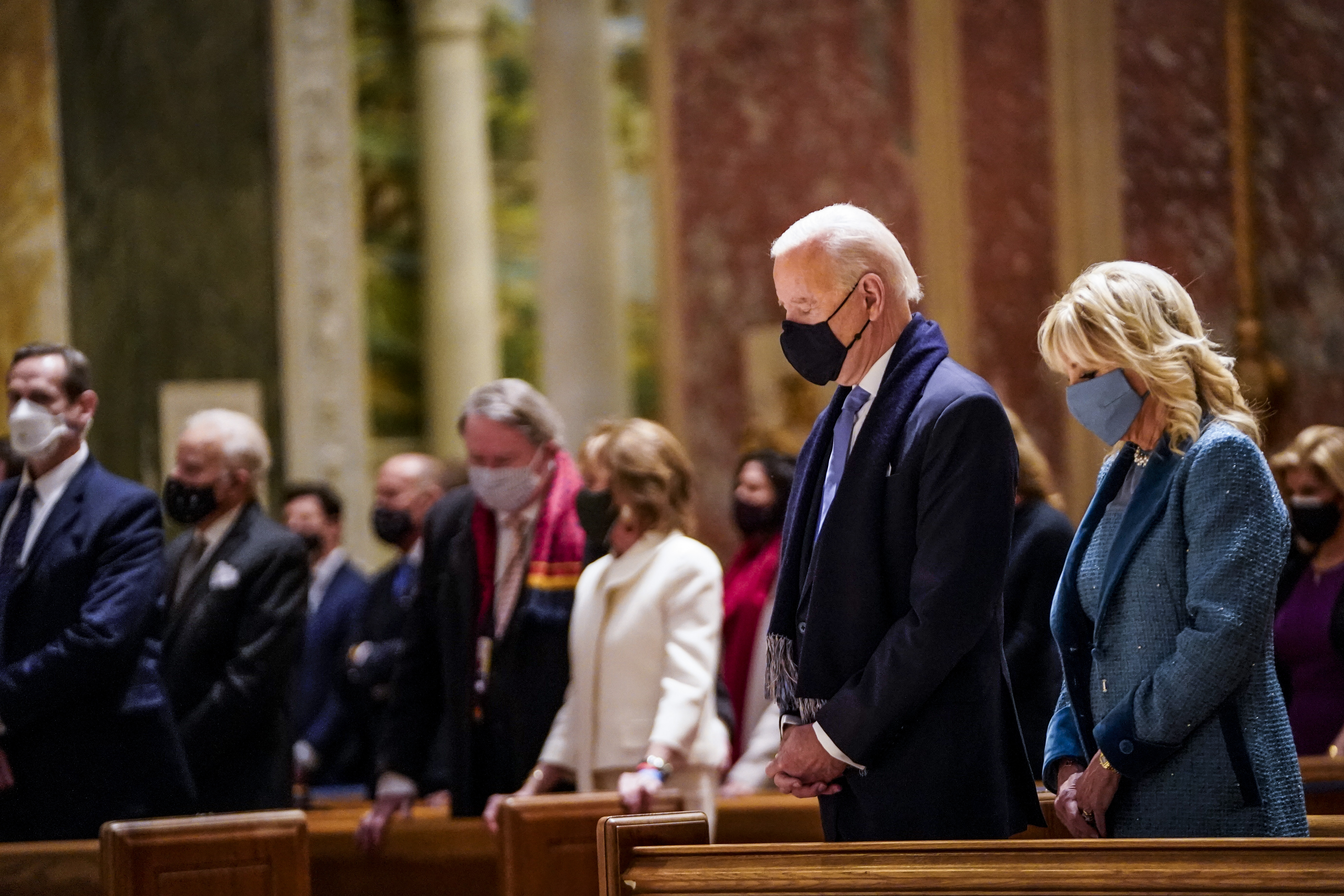 President-elect Biden and Jill Biden pray at the Cathedral of St. Matthew the Apostle in Washington, D.C., on Inauguration Day. With Biden’s election, writes Julie Kohler, “progressive theology and economics are no longer operating at the political margins; they have moved decidedly into the mainstream.”