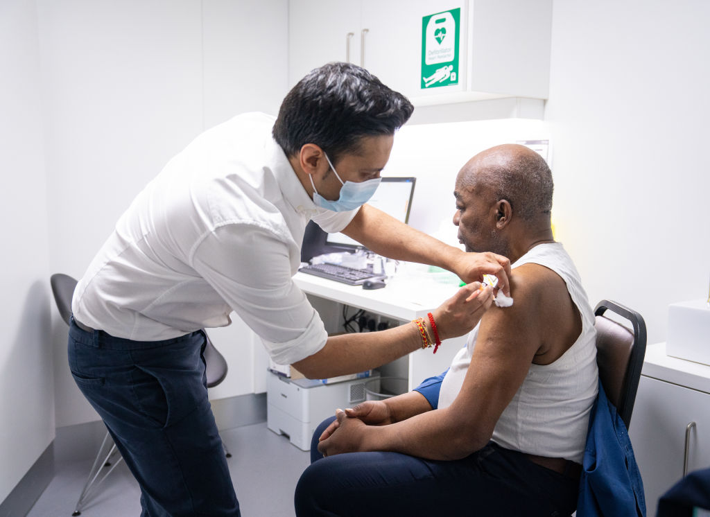 A man getting an injection.