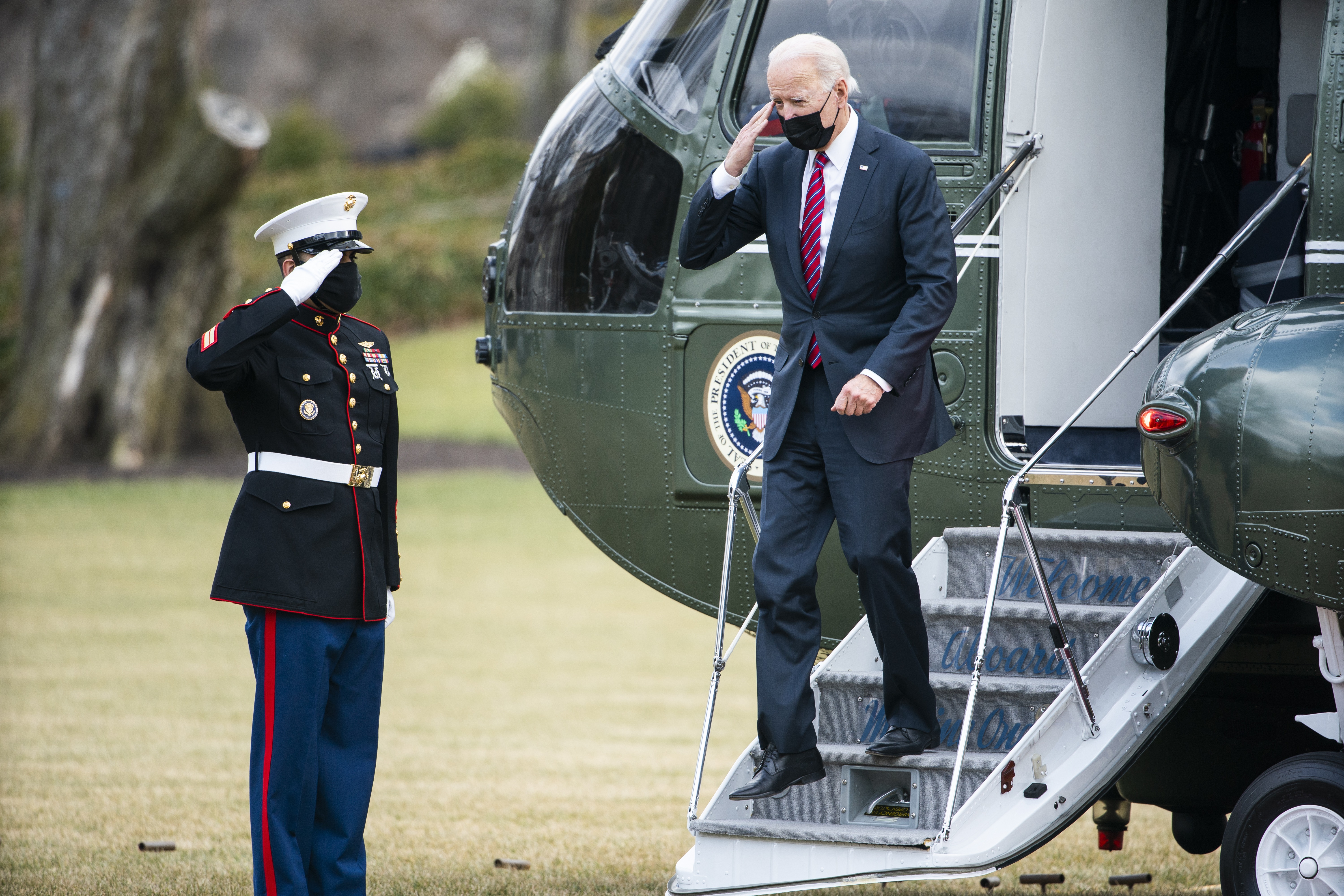 President Joe Biden disembarks from Marine One on the South Lawn of the White House on Jan. 29, 2021.