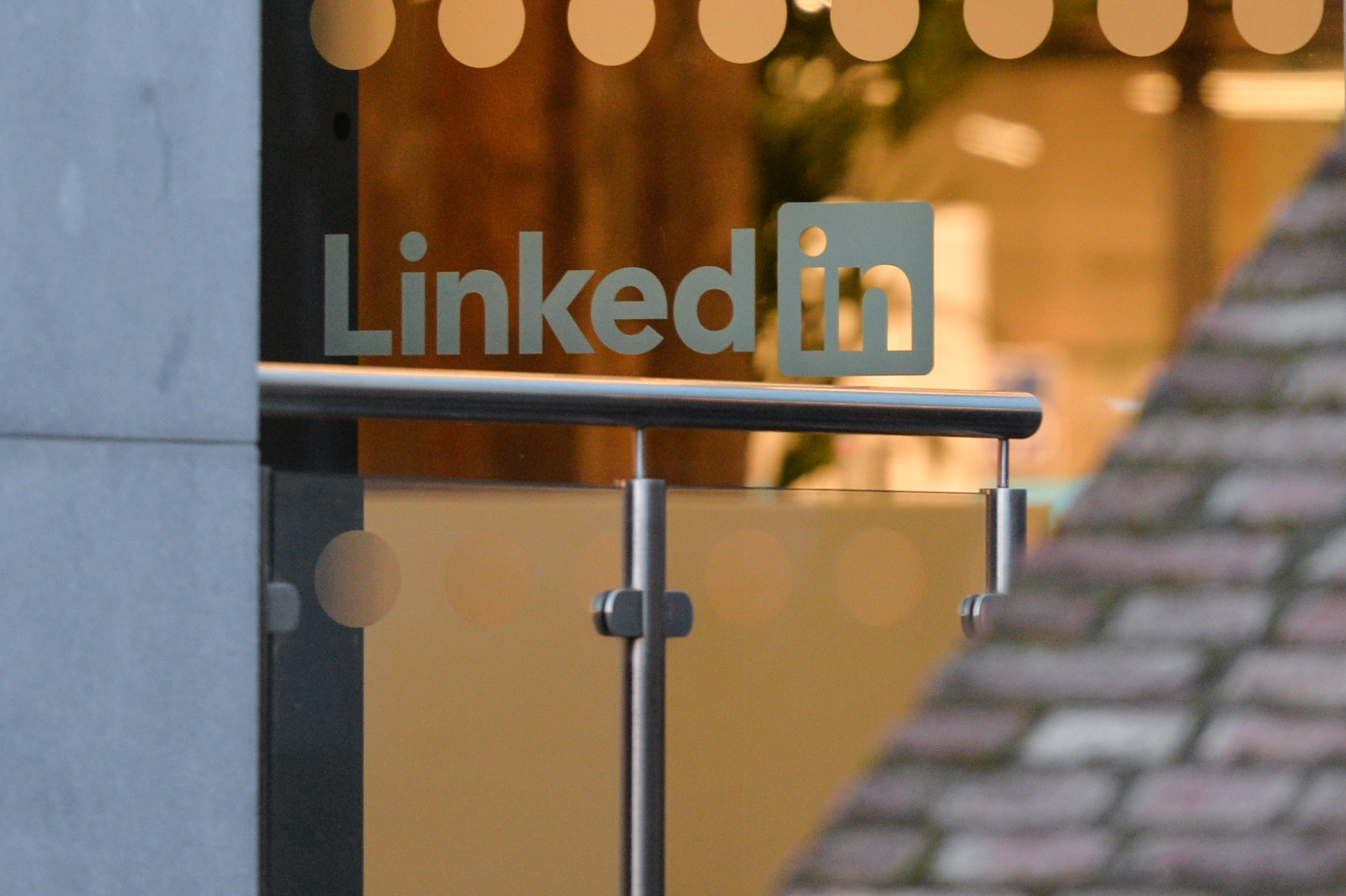 LinkedIn executives sit with their teams.