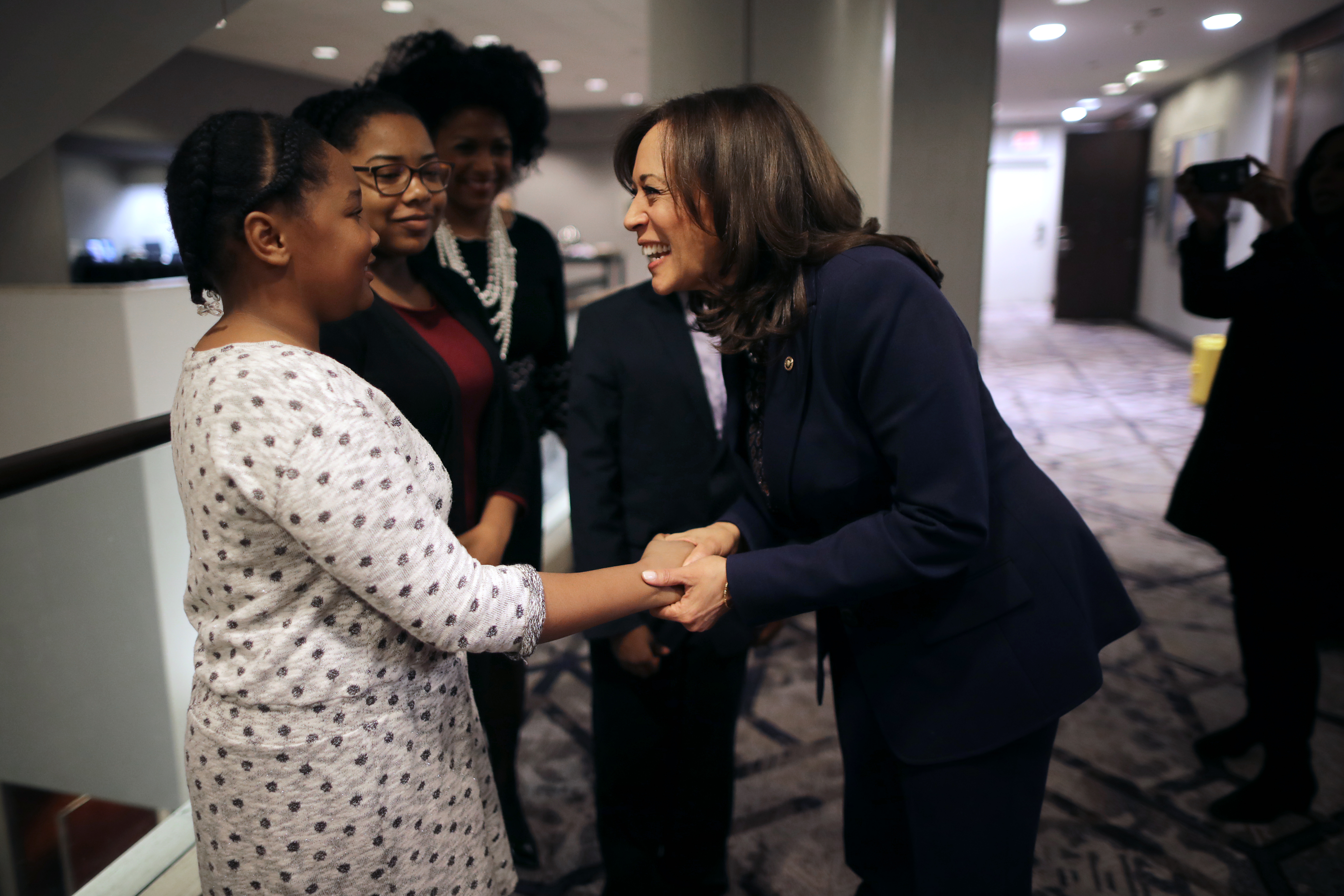 Then-Senator Kamala Harris, a Spelman College graduate,talks with young people after a Thurgood Marshall College Fund event on February 07, 2019 in Washington, DC.