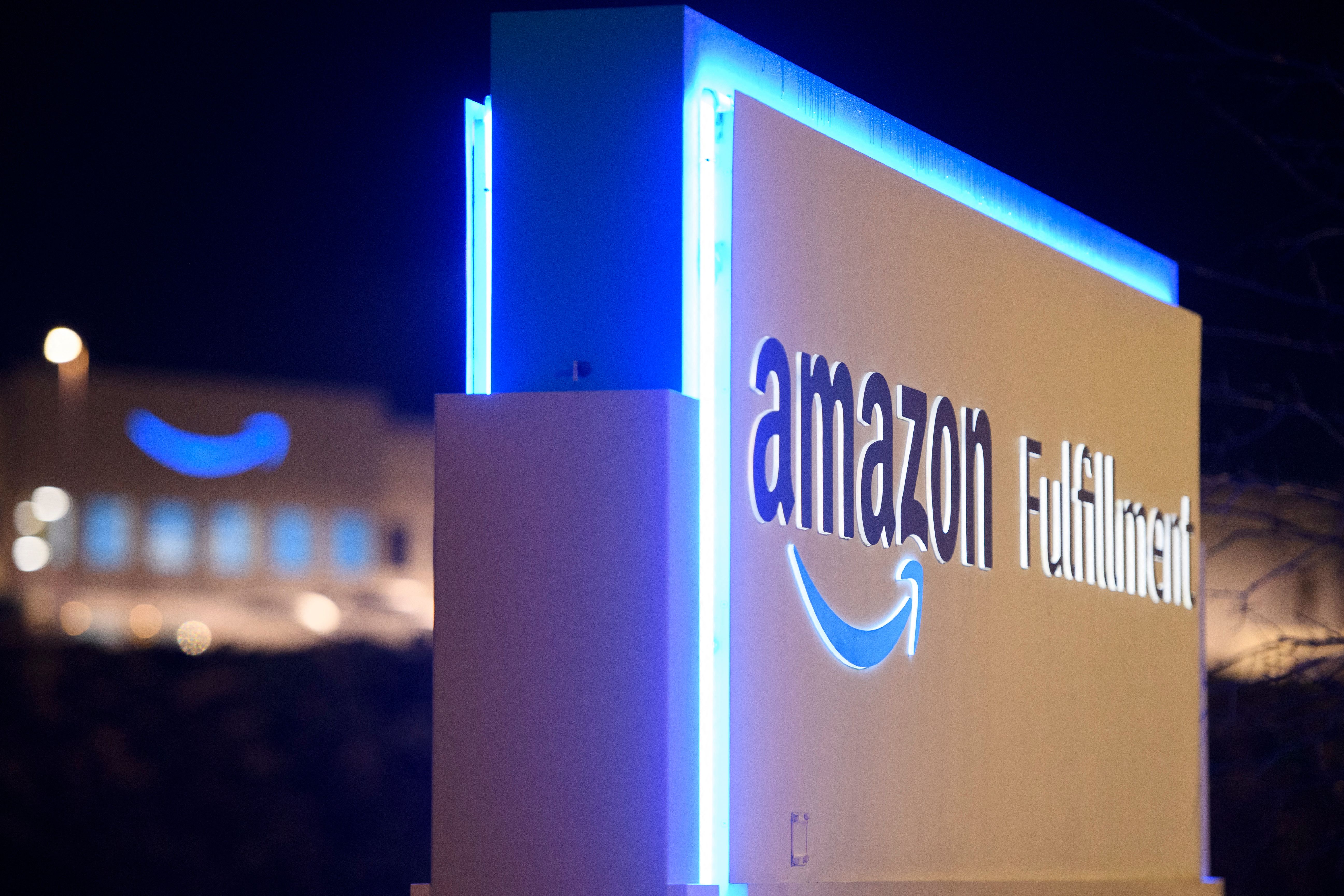 A sign at the Amazon.com, Inc. BHM1 fulfillment center is seen before sunrise on March 29, 2021 in Bessemer, Ala. Votes are set to be counted on March 29, 2021 on whether to create the first Amazon union in the United States, at a warehouse in Alabama, after a historic, five months-long David vs Goliath campaign. 'I'm proud of the workers at Amazon for standing up and saying enough,' said Joshua Brewer, the local president of the Retail, Wholesale and Department Store Union.