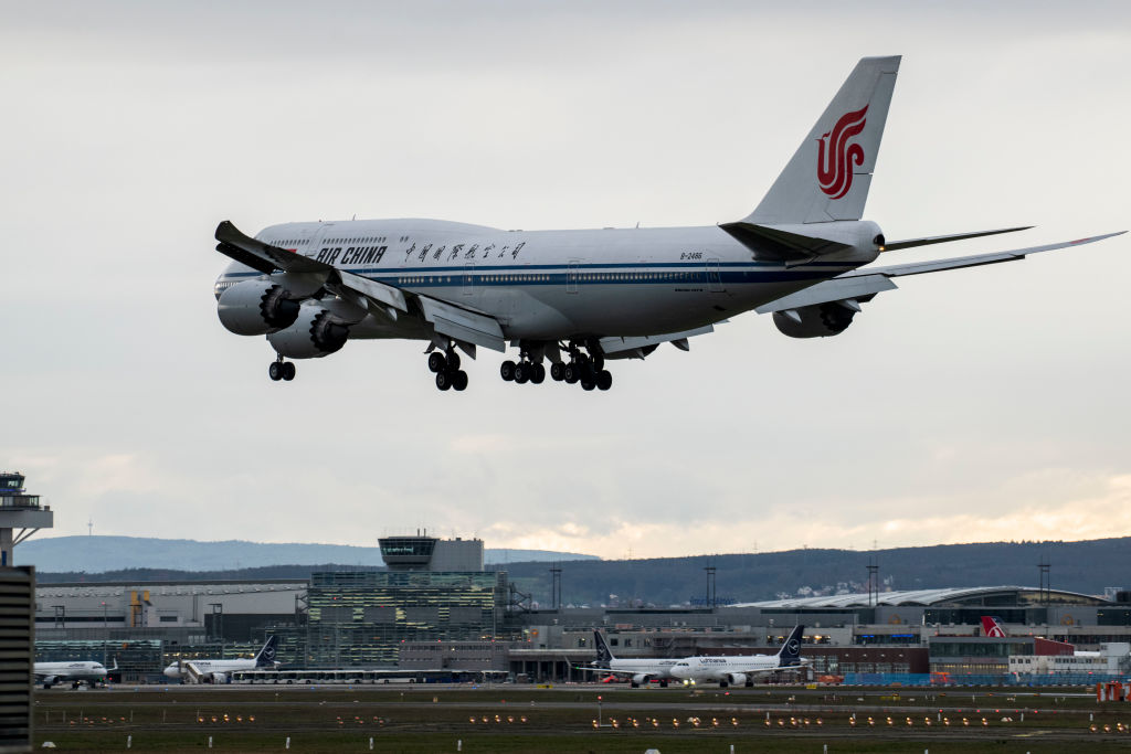 An Air China plane lands at Frankfurt Airport on March 12, 2020.
