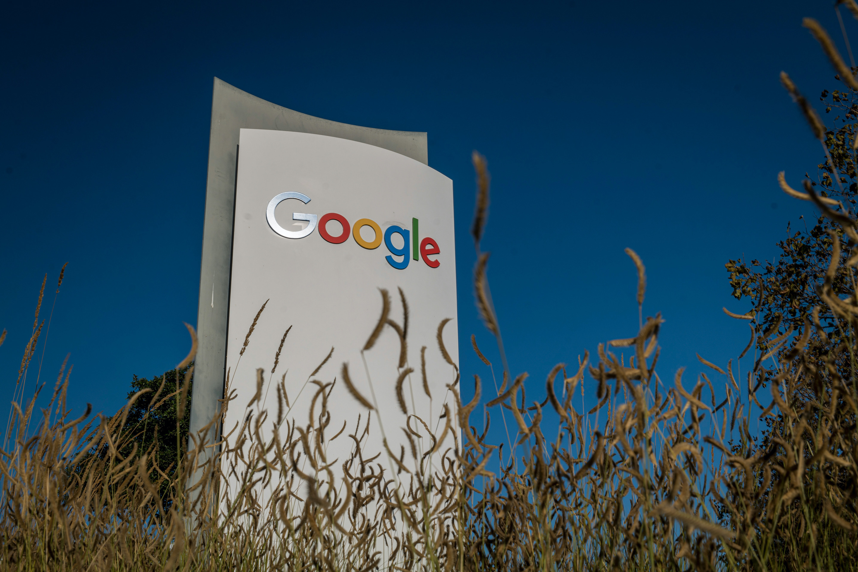 Signage is displayed in front of a building on the Google campus in Mountain View, California on Oct. 21, 2020.