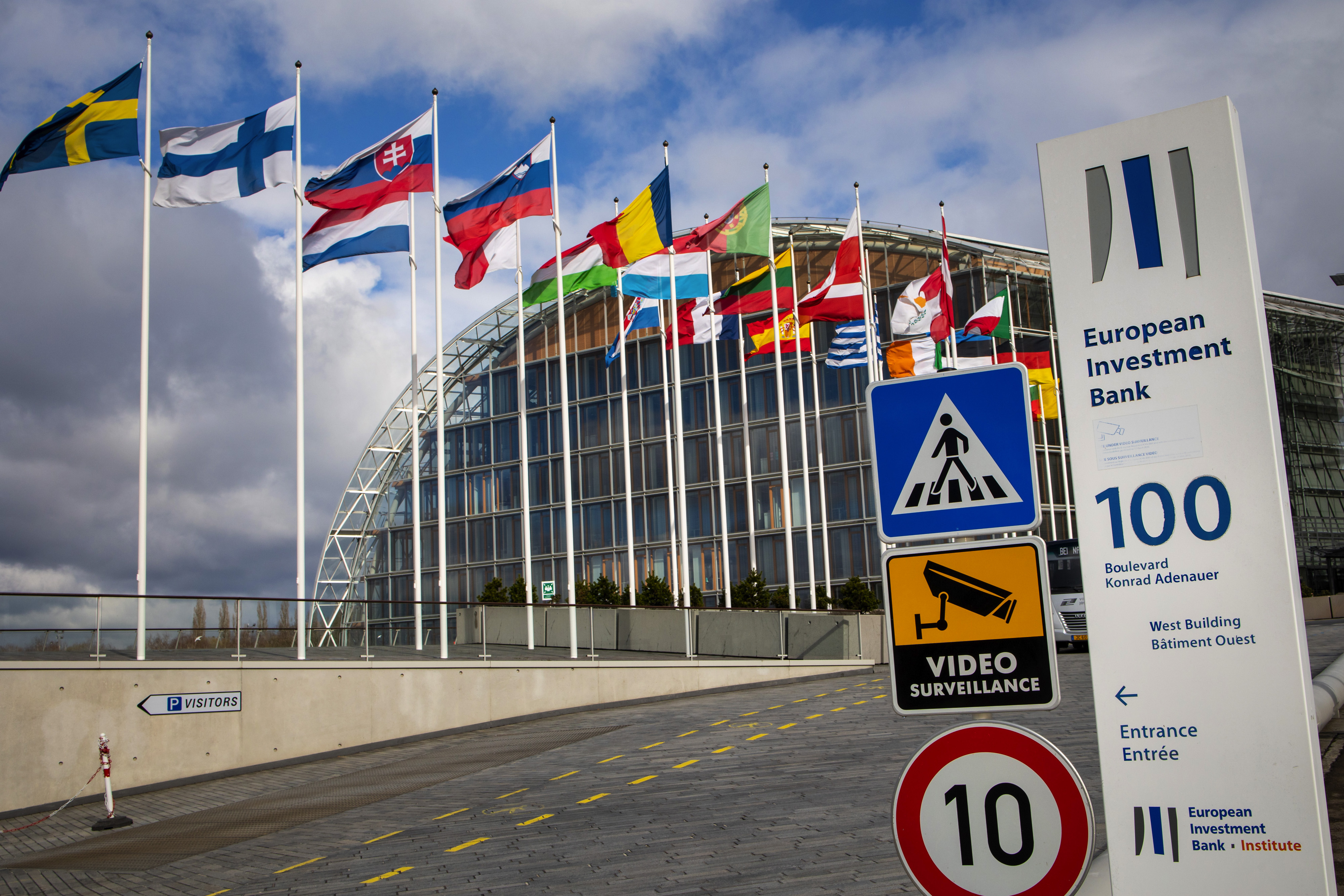 European national flags fly outside European Investment Bank (EIB) West building in Luxembourg.