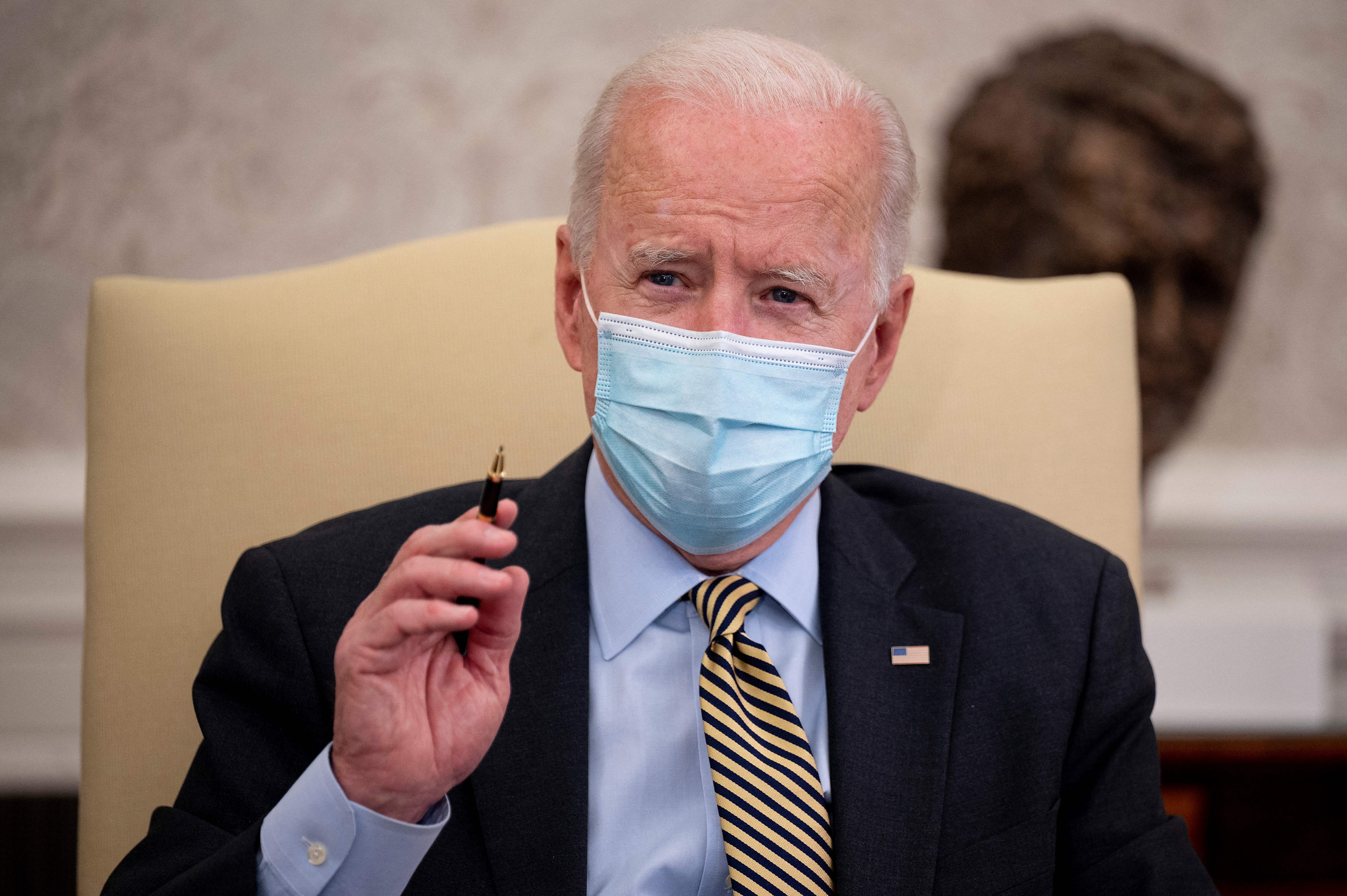 US President Joe Biden speaks during the weekly economic briefing in the Oval office of the White House in Washington, DC, on April 9, 2021.