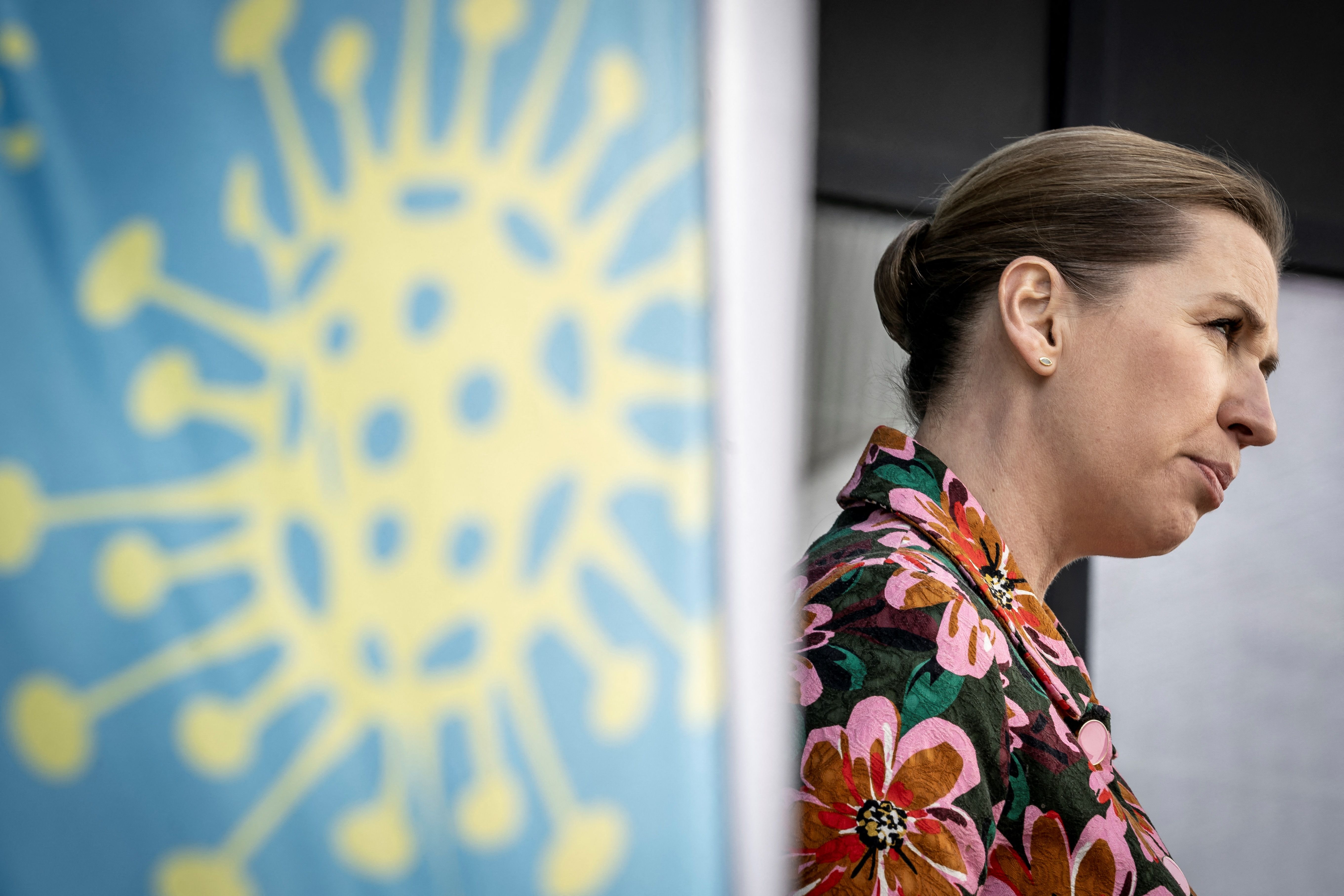 Denmark's Prime Minister Mette Frederiksen addresses a press conference after a visit to the vaccination center set up at the Congress Center in Roskilde, Denmark, on April 12, 2021. The country has become the first to entirely pause the AZ vaccine entirely