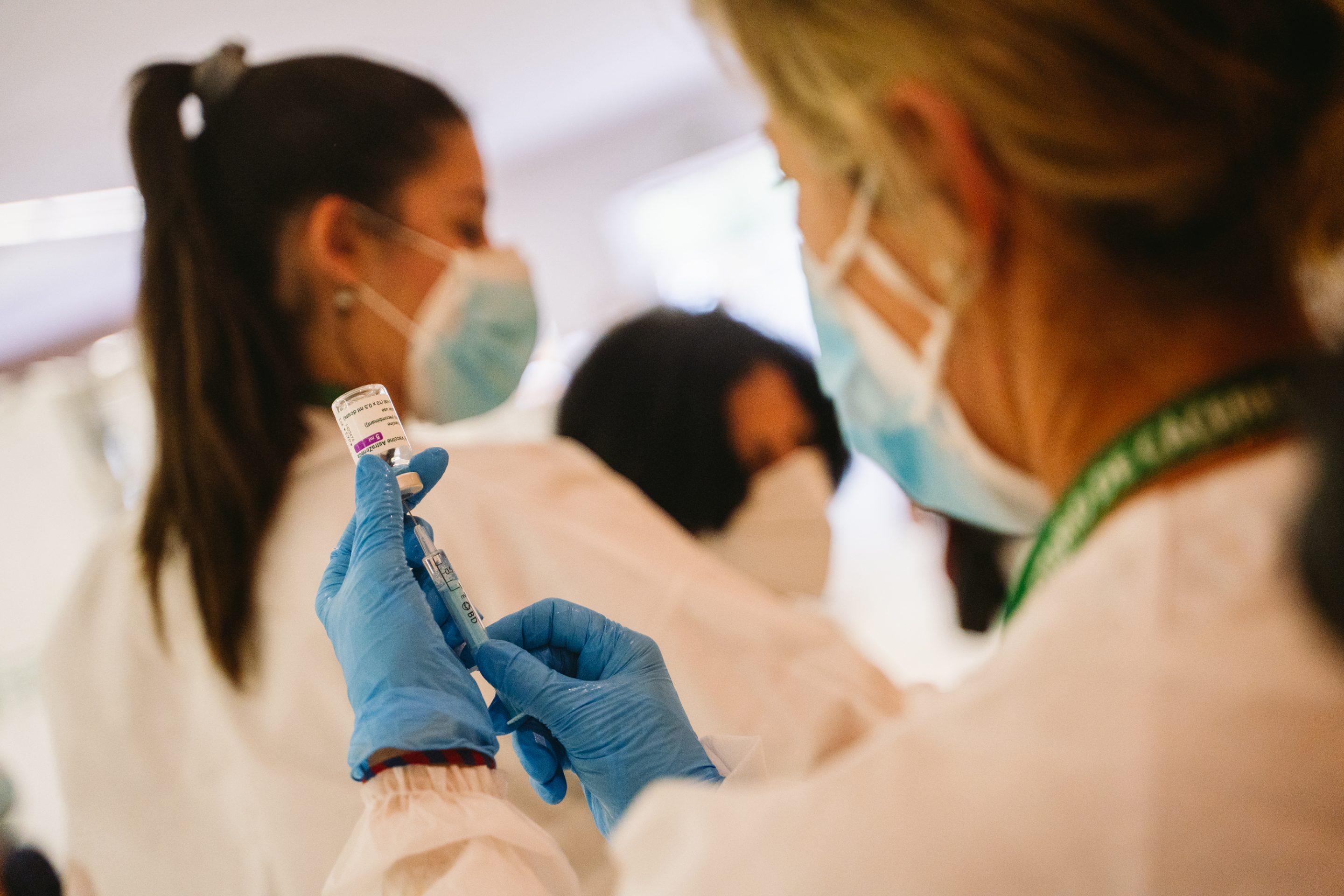 A nurse prepares a syringe with a dose of the AstraZeneca vaccine during the COVID-19 vaccination campaign at the Palacio de Congresos de Cáceres in Spain in April 2021.