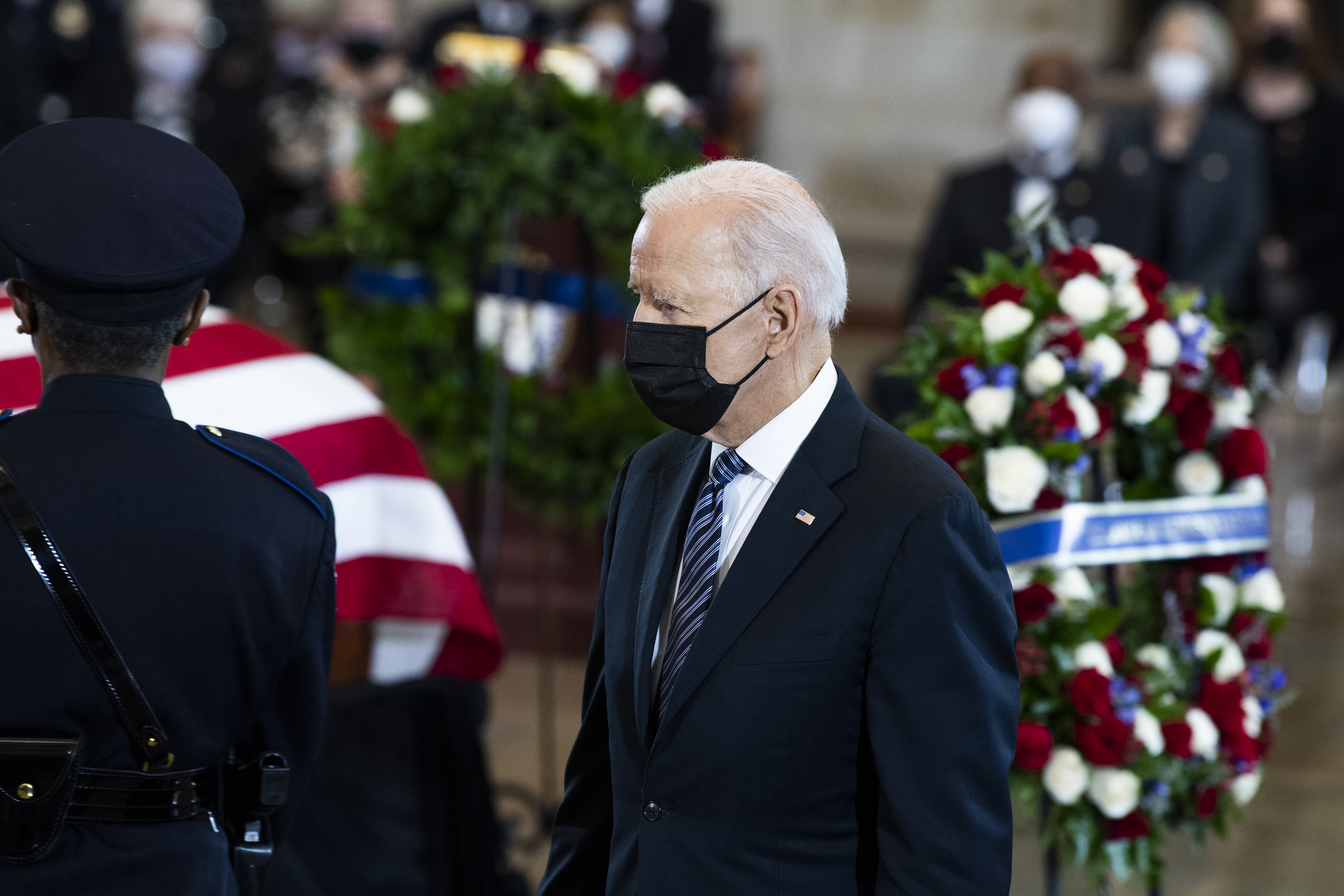 President Joe Biden attends the service for U.S. Capitol Officer William Billy Evans, as his remains lie in honor in the Capitol Rotunda in Washington, D.C.