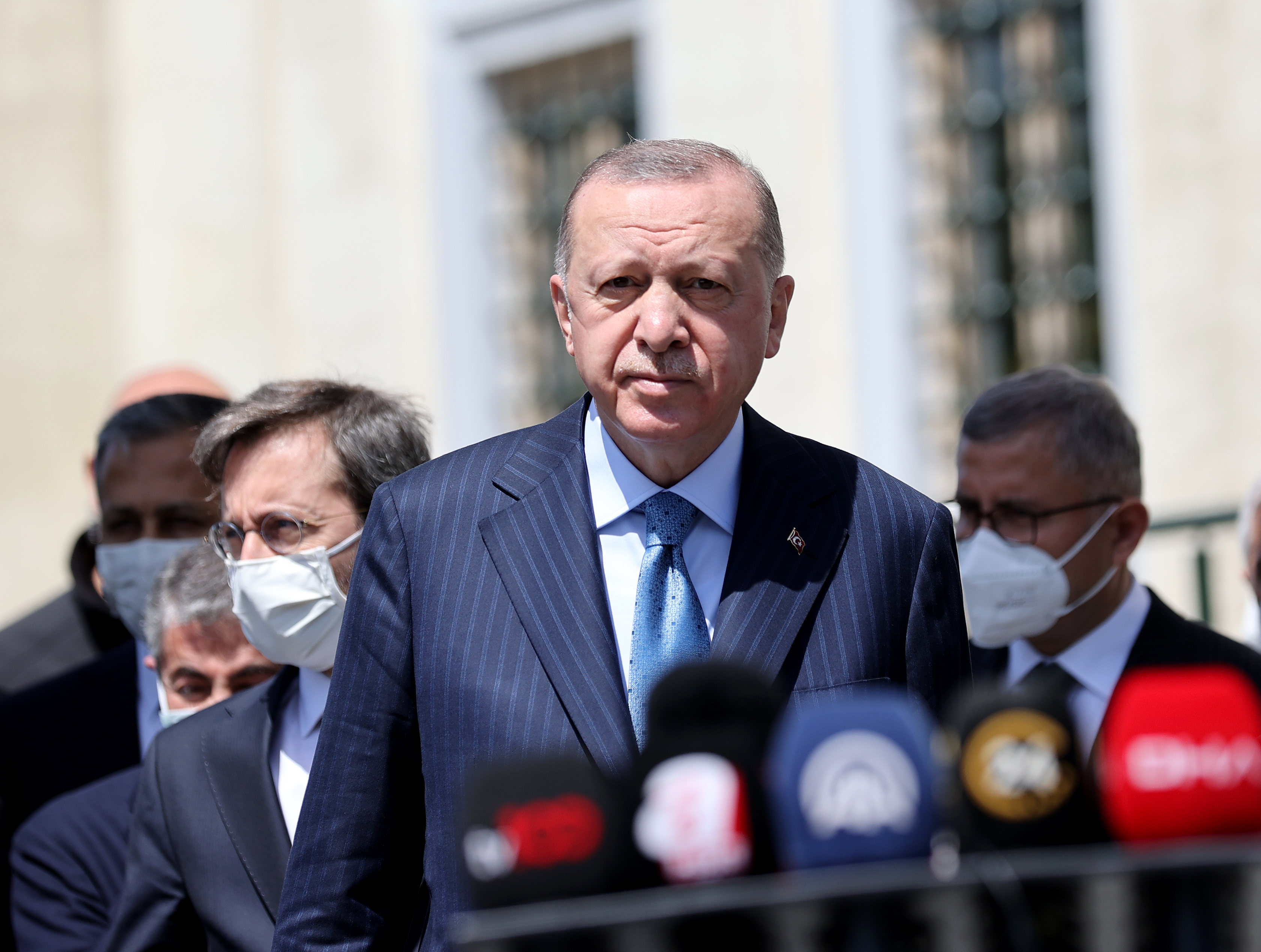 Turkish President Recep Tayyip Erdogan speaks to the press after performing Friday prayer on April 30.
