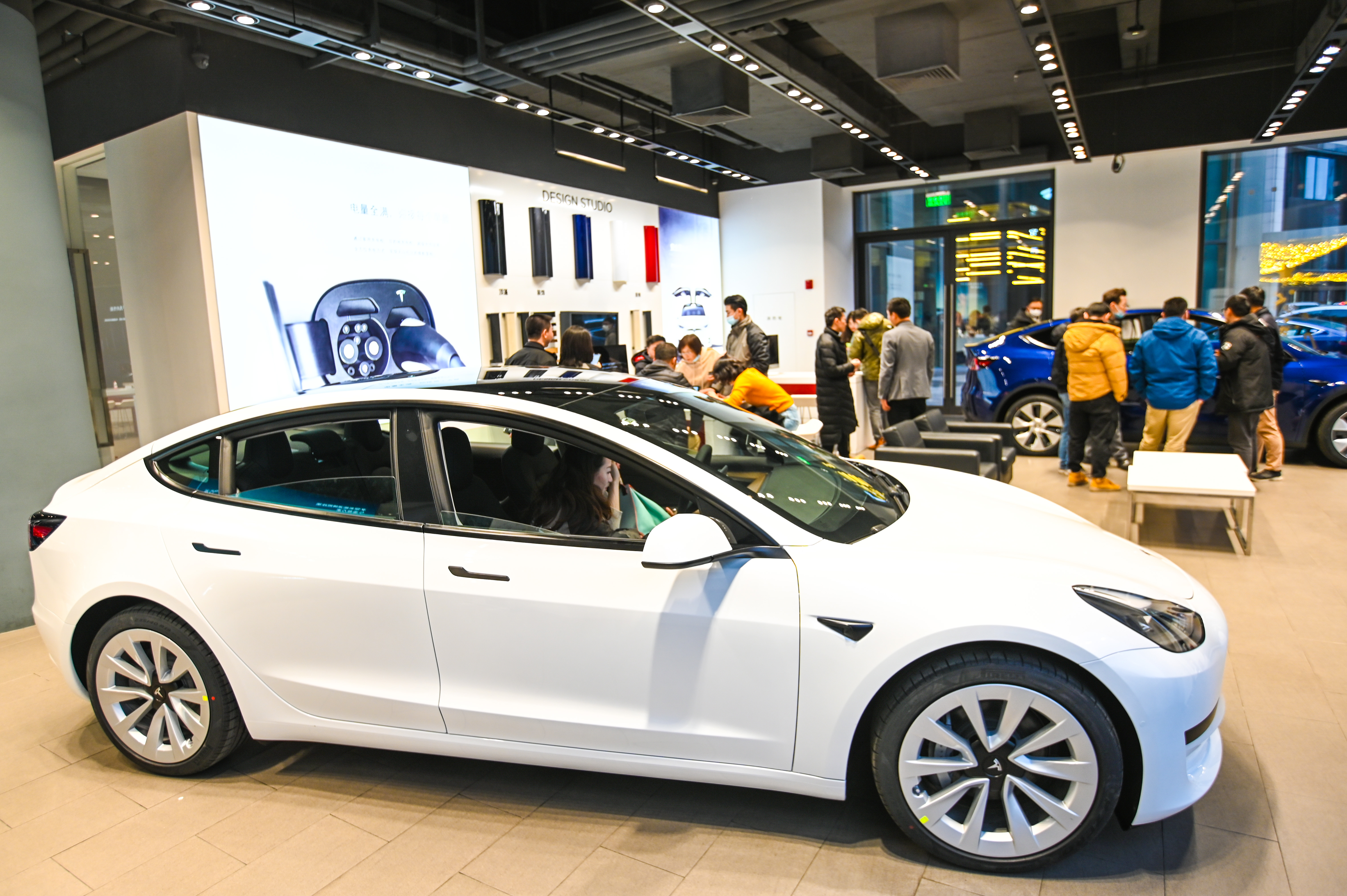 Tesla earnings report sent the company's shares down. 