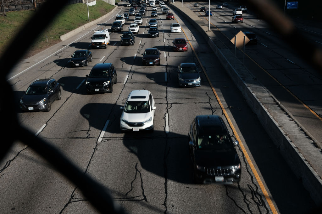 Motorists drive down a highway on April 8, 2021, in Providence. 