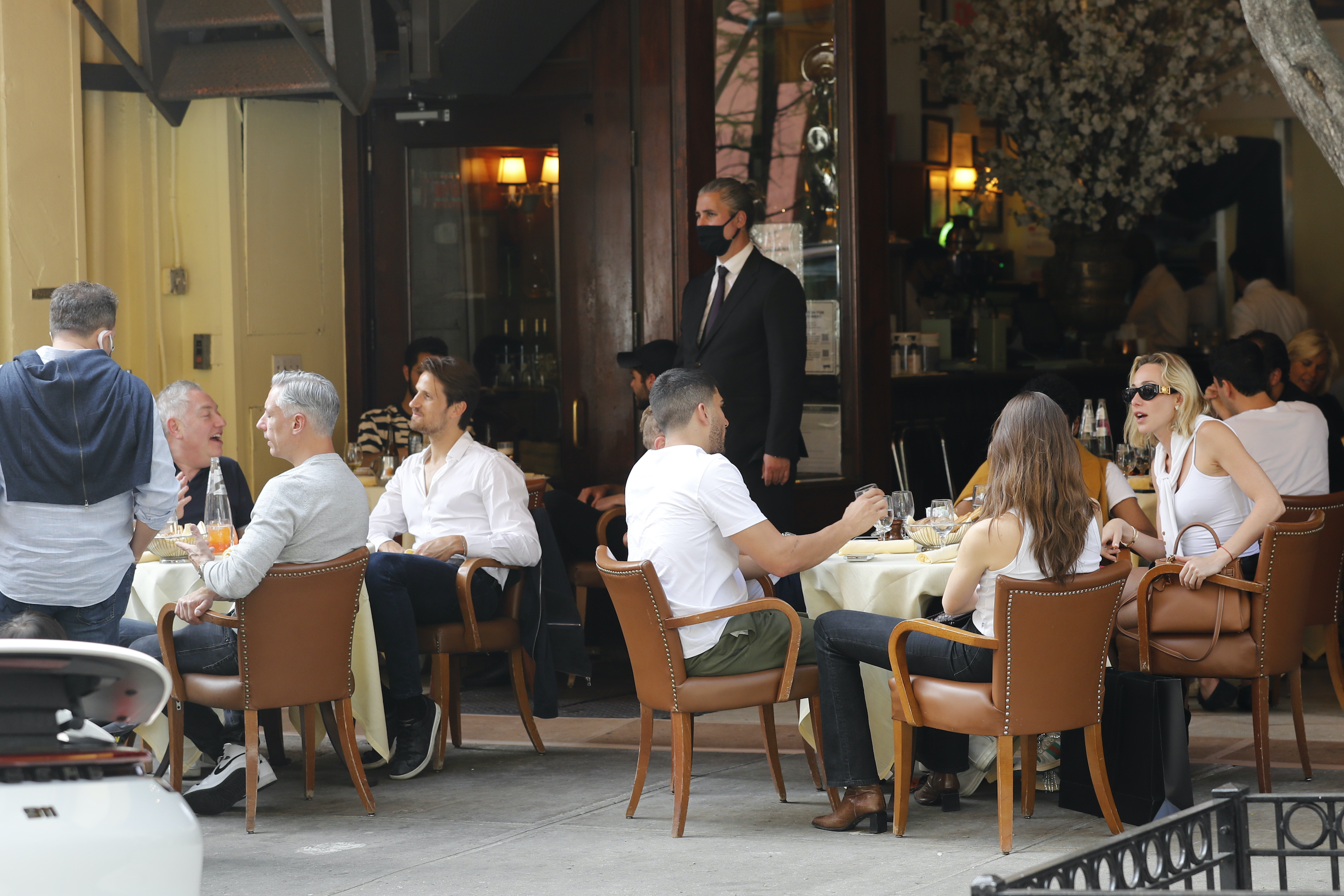 Customers have lunch at a restaurant on April 28, 2021 in New York City.