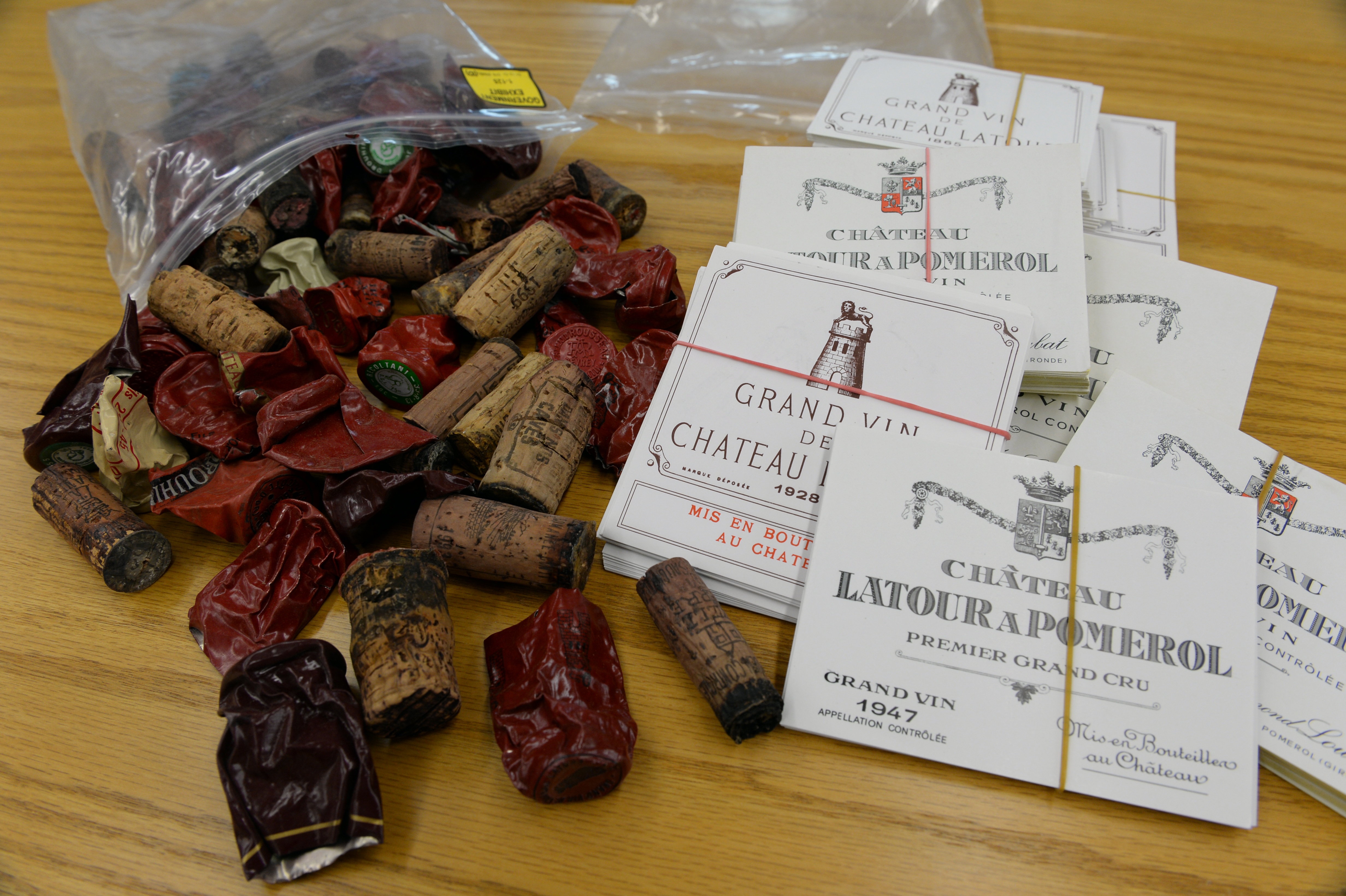 Corks, foil capsules and wine labels that were used as evidence in the trial of wine dealer Rudy Kurniawan.