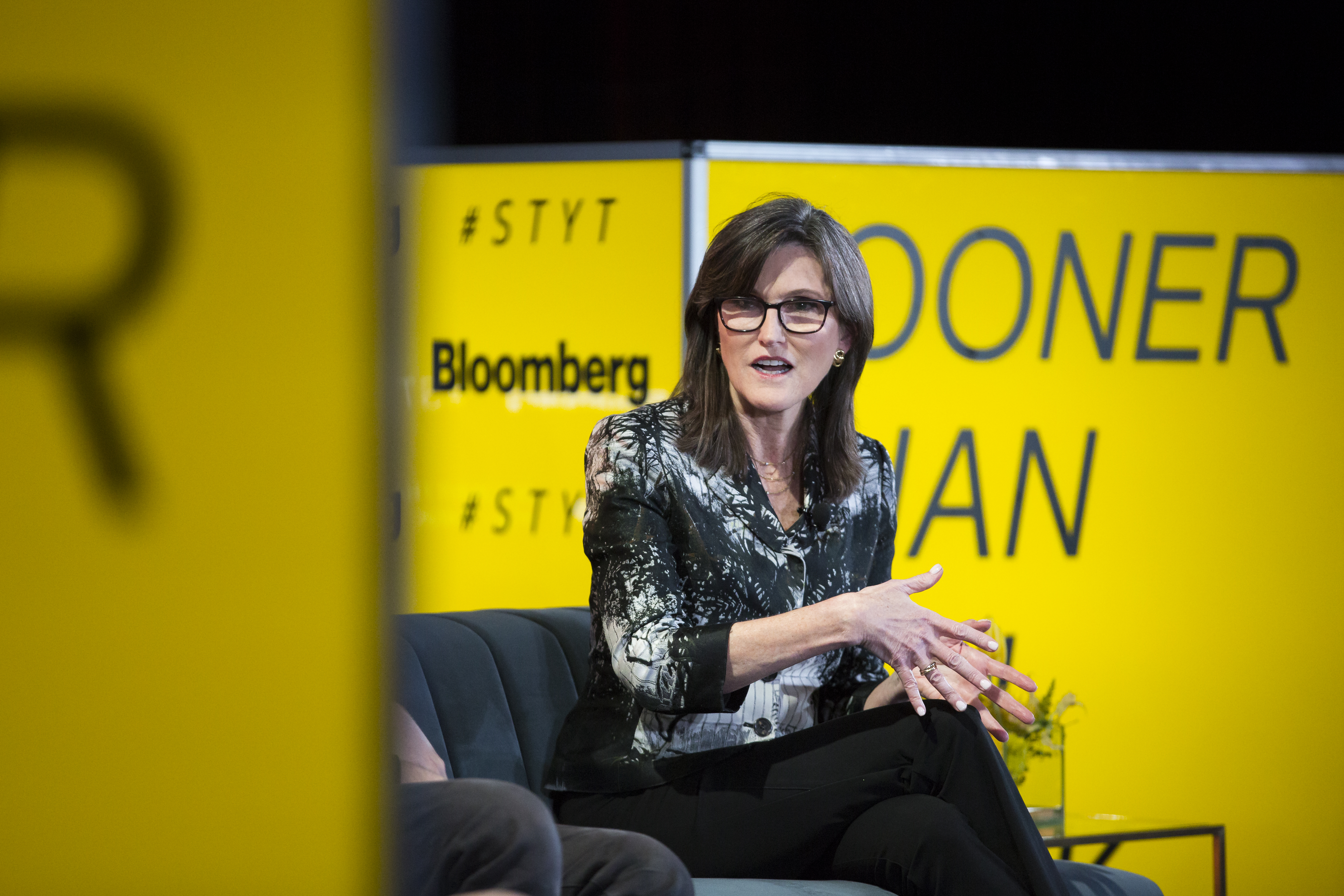 Cathie Wood, chief executive officer and chief investment officer of ARK Investment Management LLC, speaks during the Sooner Than You Think conference in the Brooklyn borough of New York on Oct. 16, 2018.