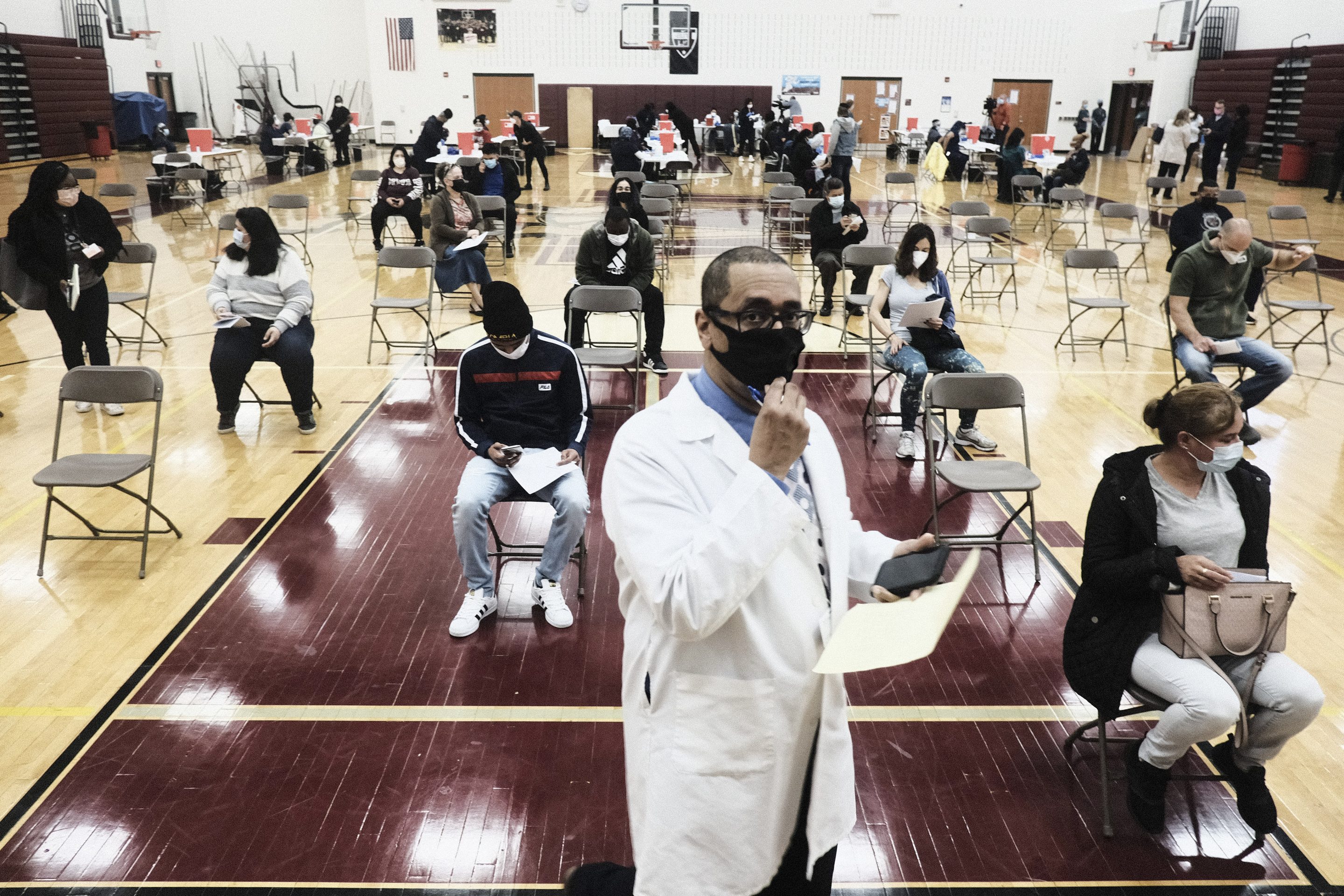 A COVID vaccination pop-up clinic in Detroit. In the pandemic, writes Lloyd Minor, “…physicians, in particular, have struggled to engage a health crisis that demands keeping entire populations healthy and out of harm’s way.”