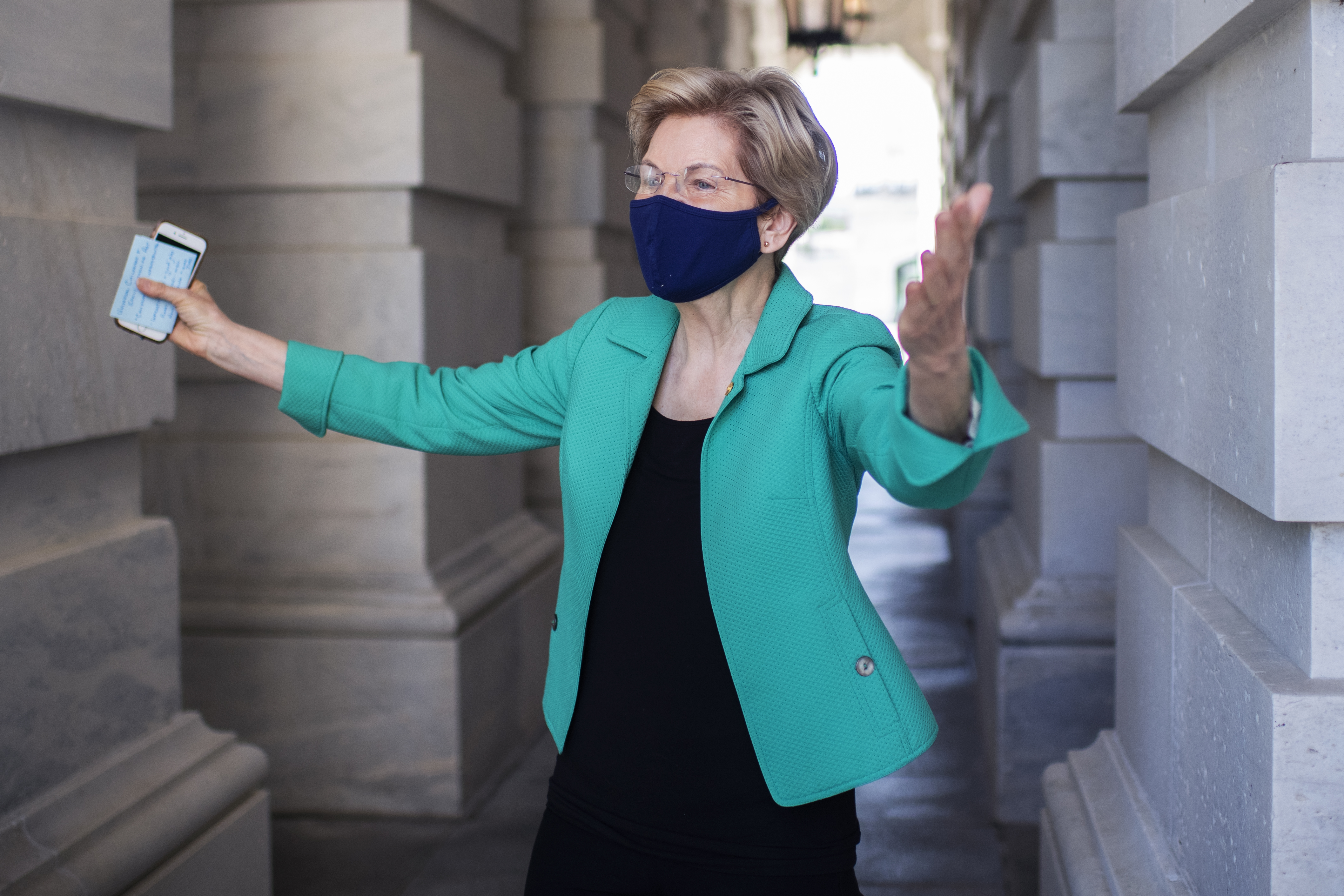 Sen. Elizabeth Warren, D-Mass., is seen before news conference to reintroduce the Universal Child Care and Early Learning Act, outside the Capitol on April 27, 2021.