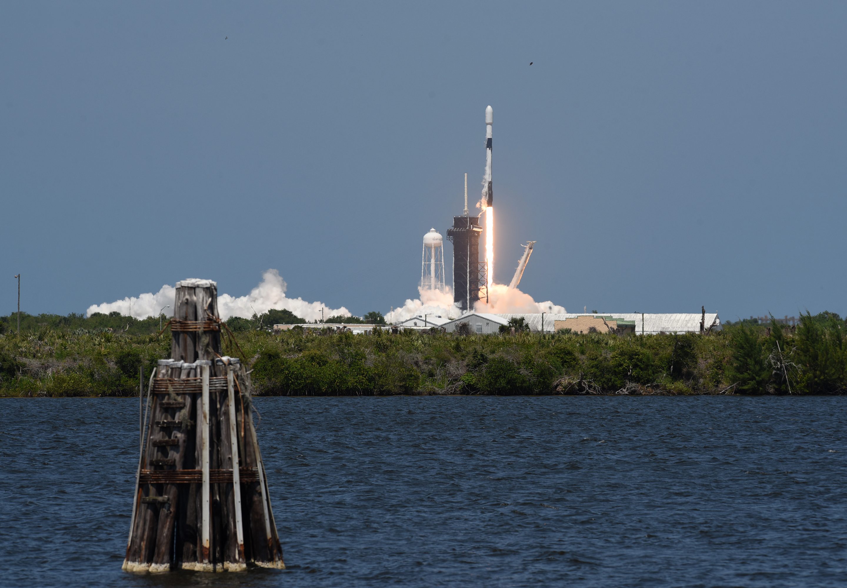 A SpaceX Falcon 9 rocket lifts off from pad 39A at the Kennedy Space Center carrying the 26th batch of 60 satellites as part of SpaceX's Starlink broadband internet network on May 4th, 2021.