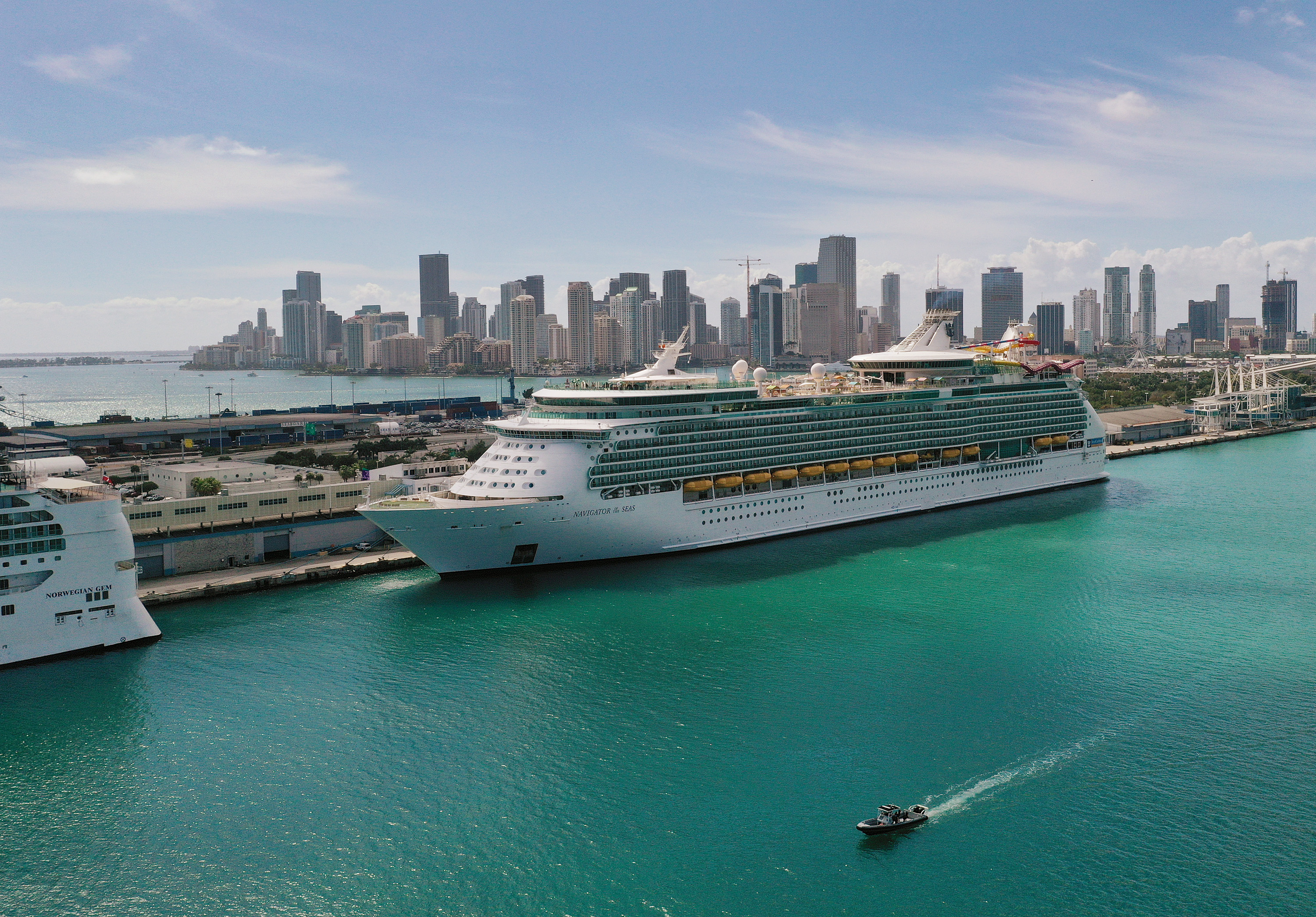 An aerial view from a drone shows Royal Caribbean’s Navigator of the Sea cruise ship docked at PortMiami on March 2, 2021 in Miami, Florida.