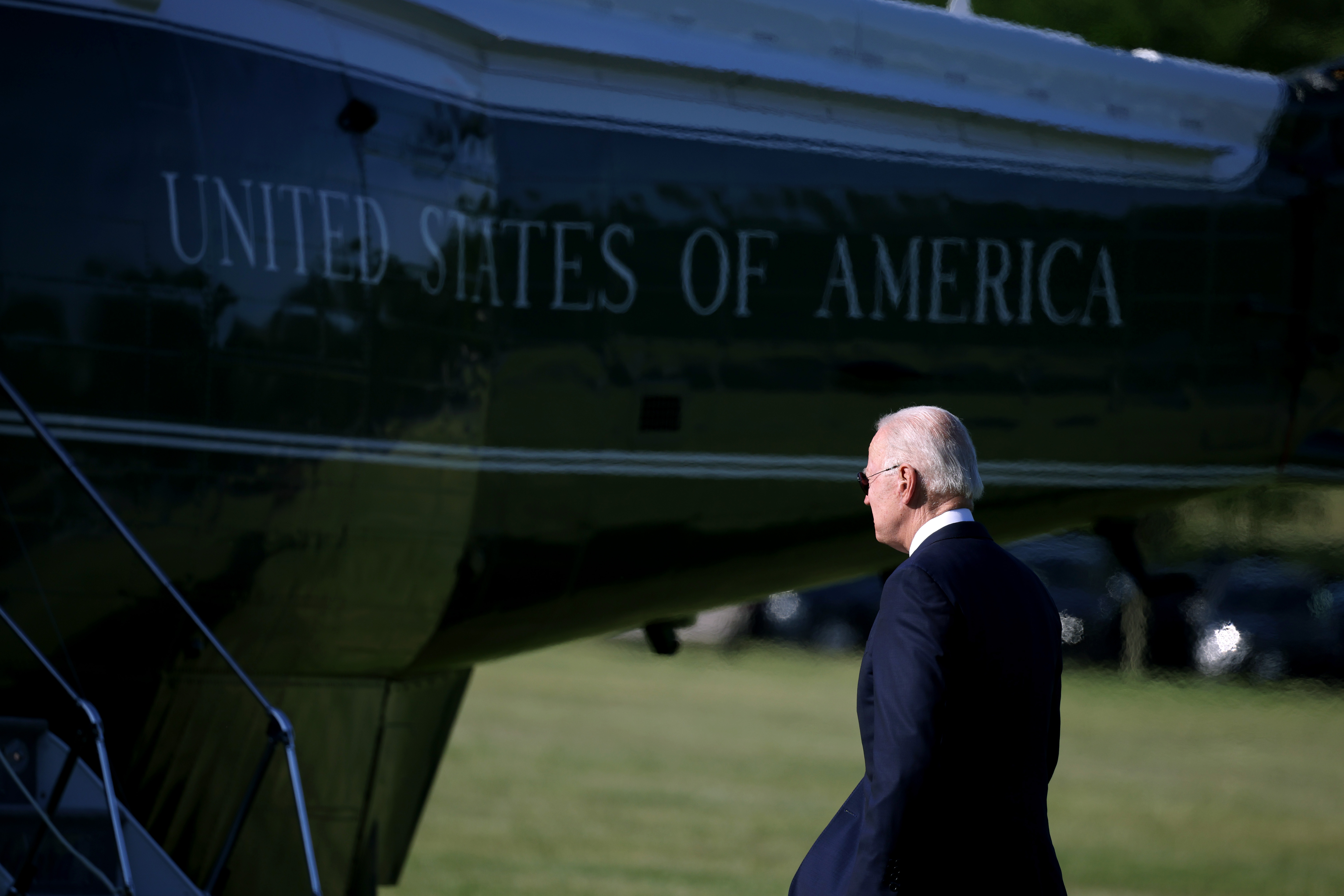 President Biden boarding Marine One on May 19, 2021. "There is no doubt that President Biden’s policy agenda is ambitious and large, but the bar for transformation is high," the authors write.