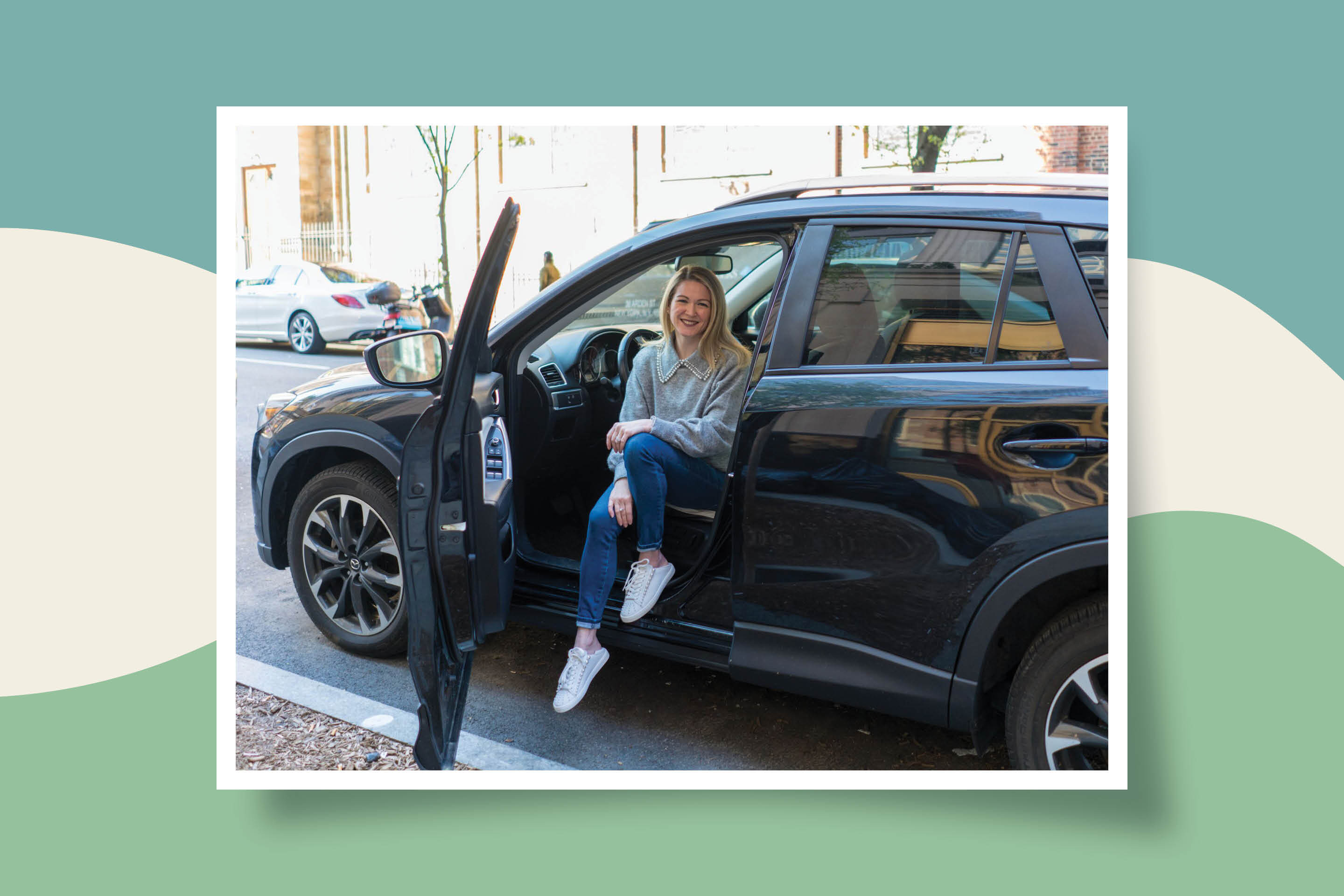 The author, in the driver’s seat of her car.