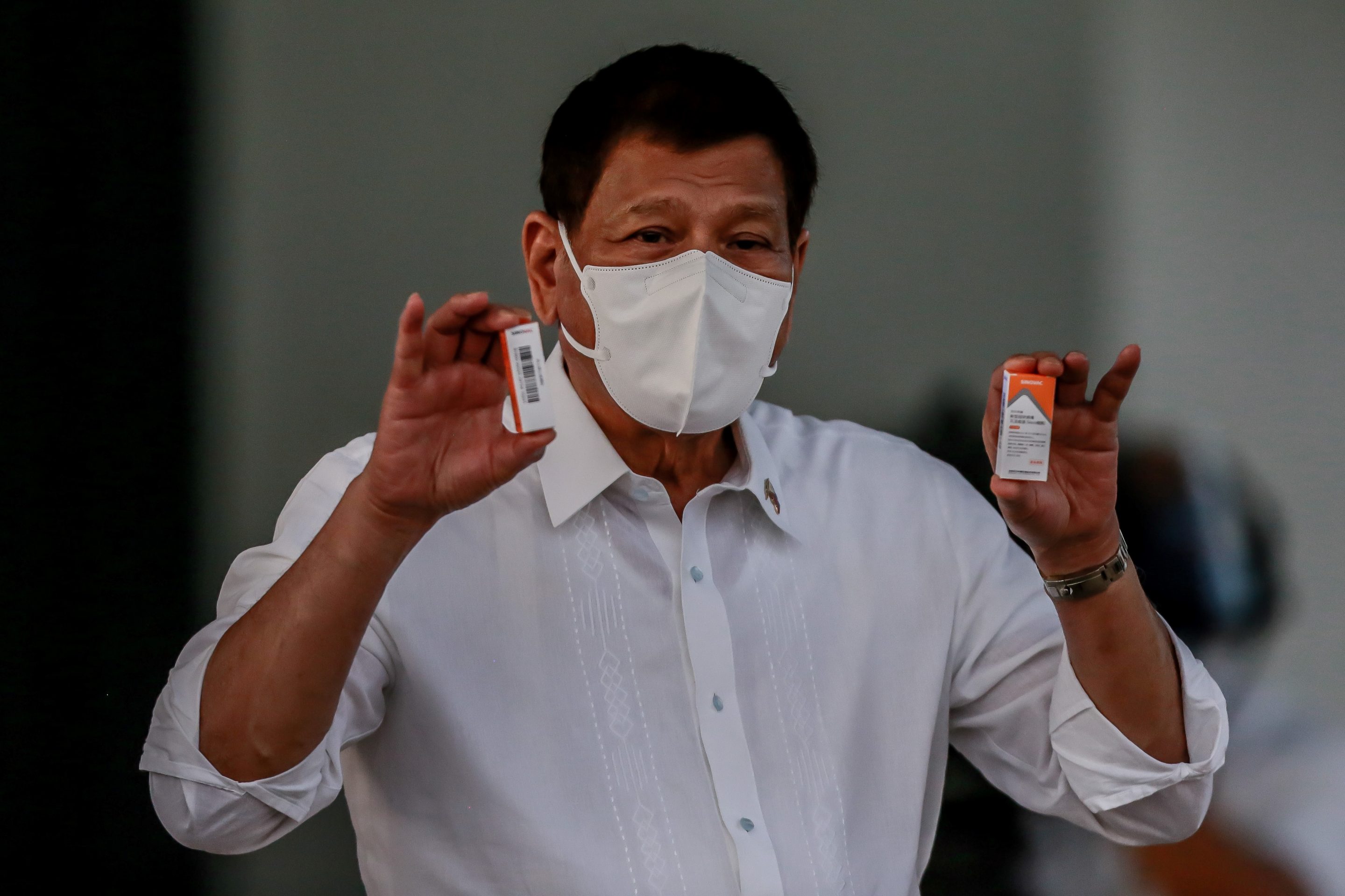Philippine President Rodrigo Duterte shows boxes of Sinovac COVID-19 vaccines in Manila, the Philippines on March 29, 2021.