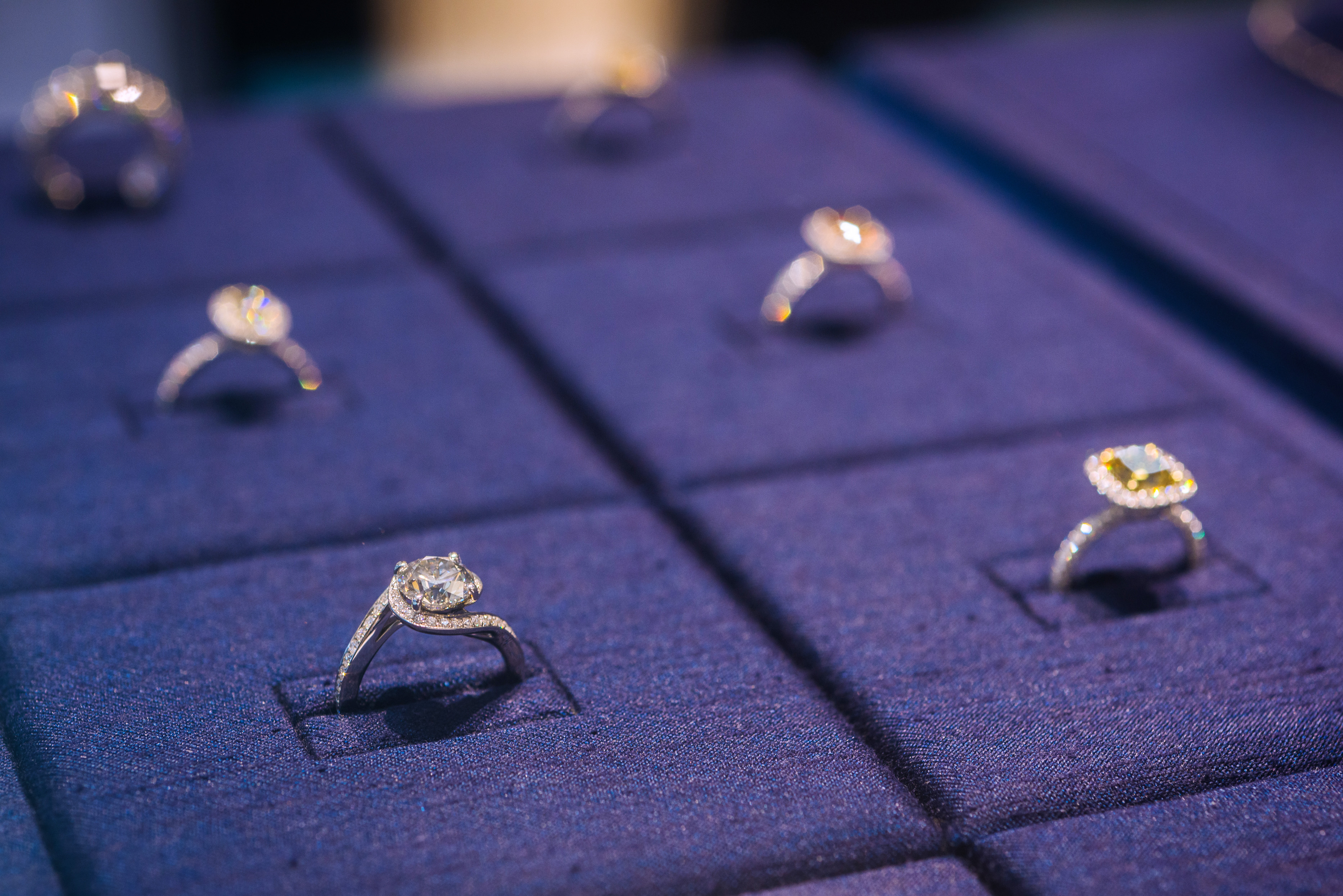 Diamond rings are displayed in a cabinet inside a De Beers SA store in Hong Kong, China, on Sept. 14, 2017.