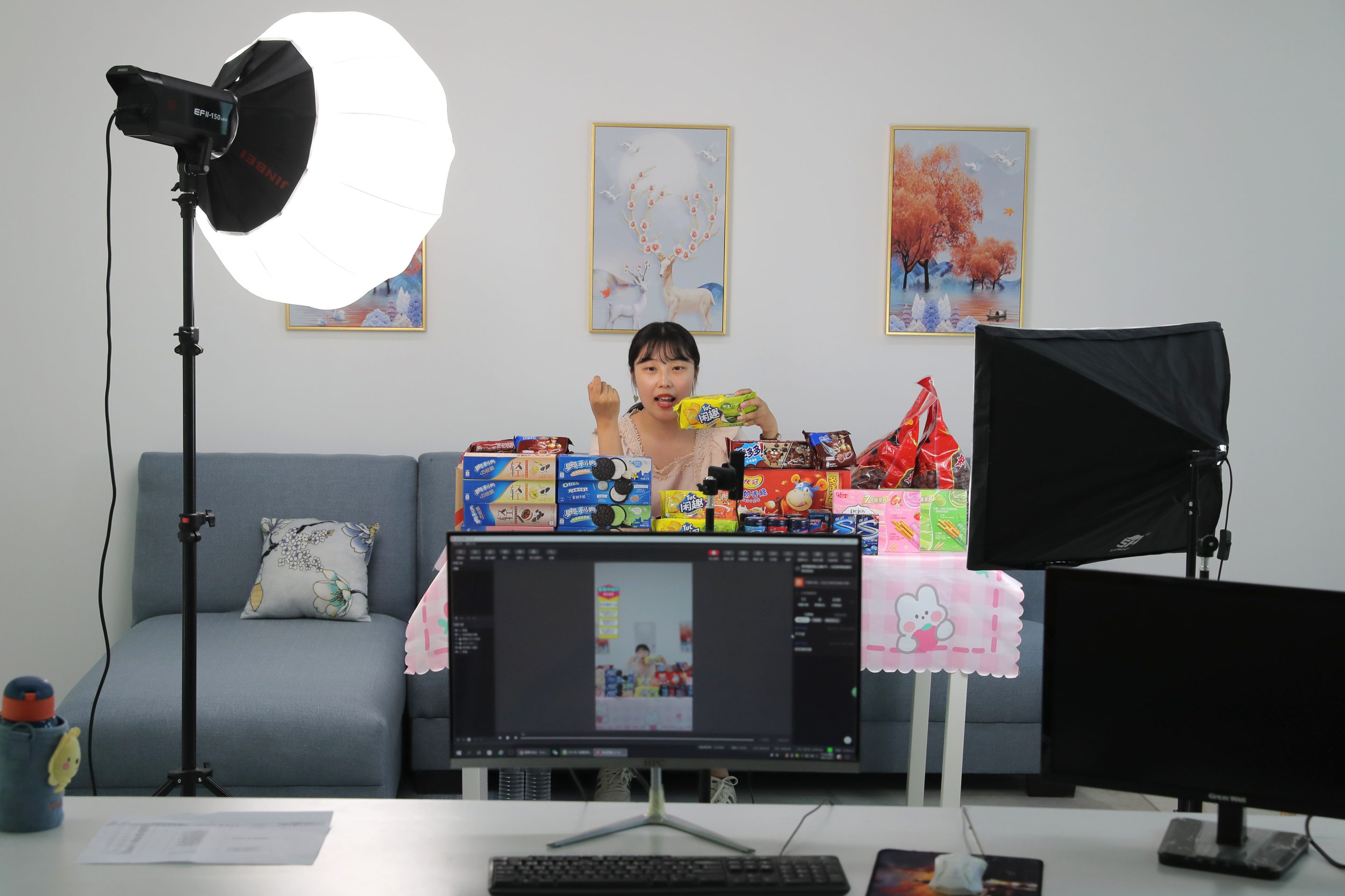 A livestreamer sells biscuits in Tianjin, China on May 21, 2021.