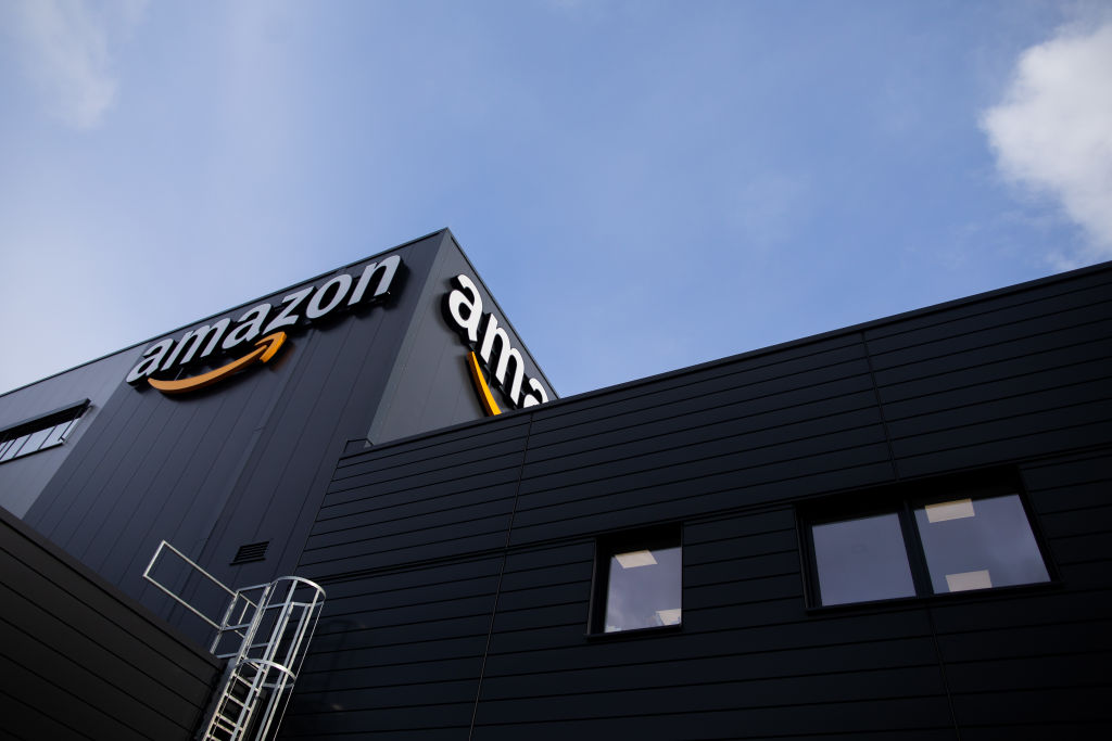 The Amazon logo can be seen at a logistics center of the mail order company Amazon. North Rhine-Westphalia, Mönchengladbach, Germany. December 8, 2020.