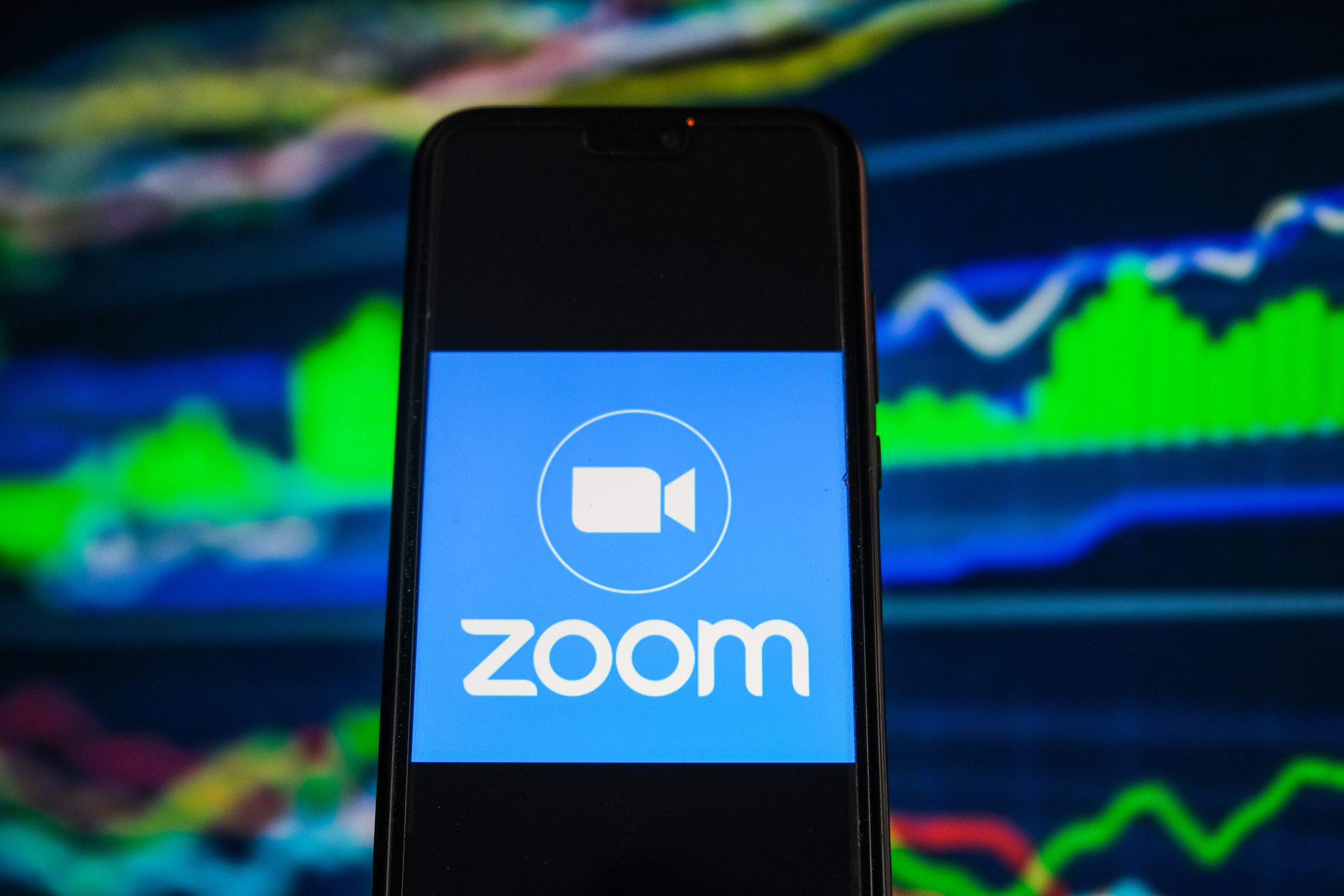 Zoom will buy Five9, a call center provider, in a deal meant to shore up its business as pandemic lockdowns ease. 