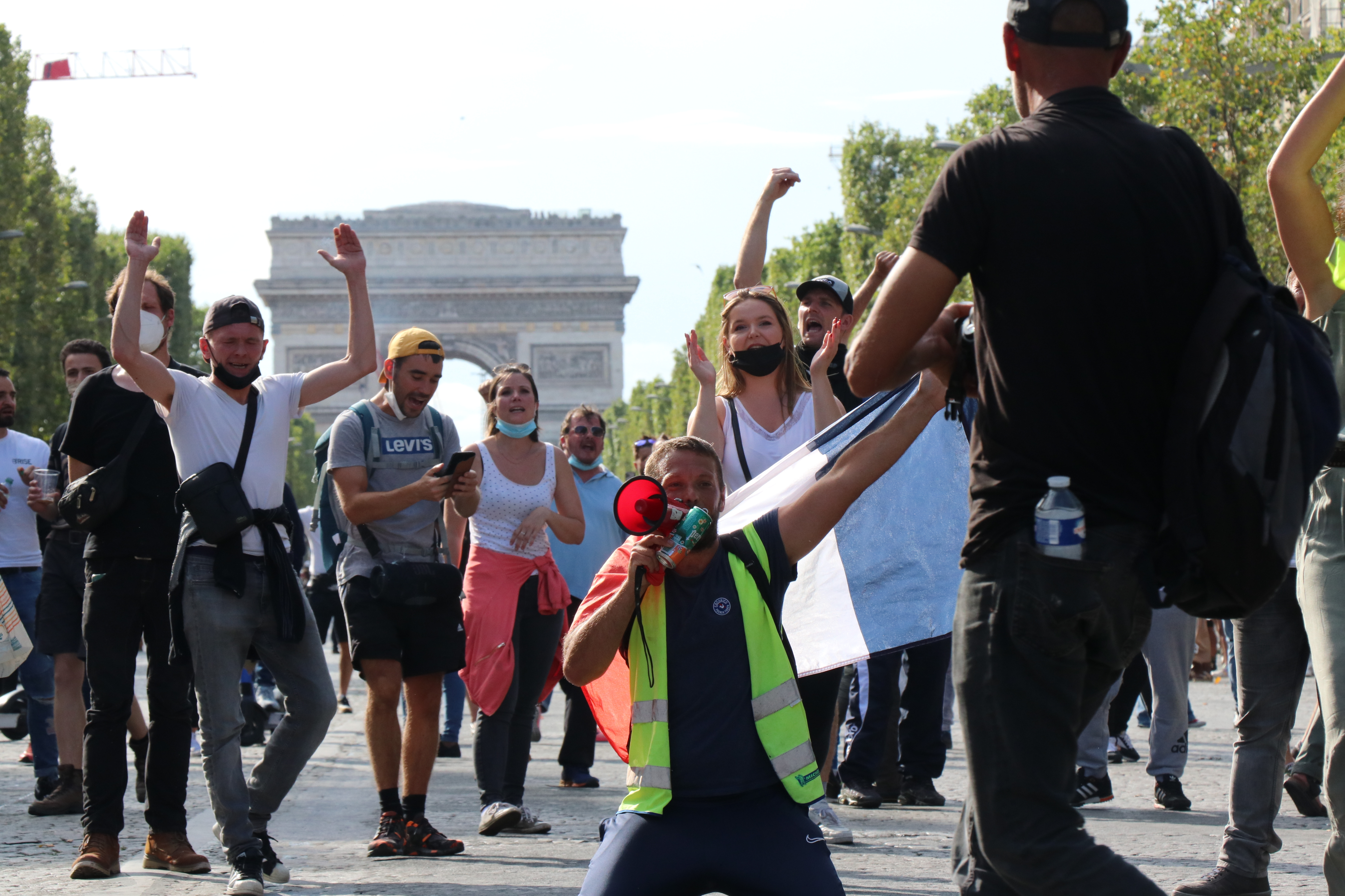 Protests against vaccines and the government's new health pass requirement continue for the second week in Paris, France on July 24, 2021. 