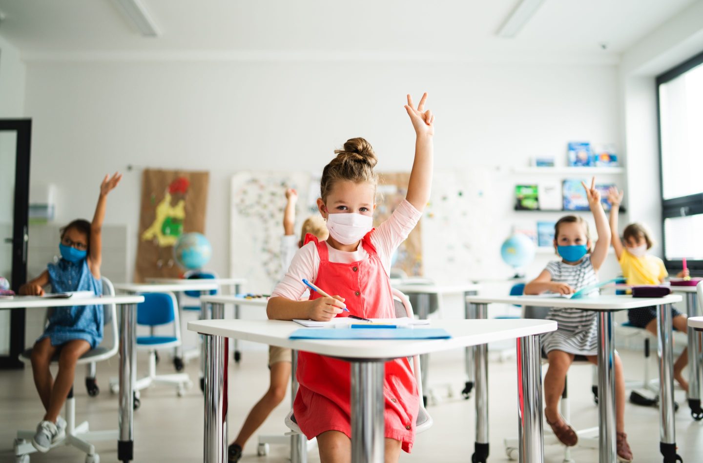 Children wearing masks in school