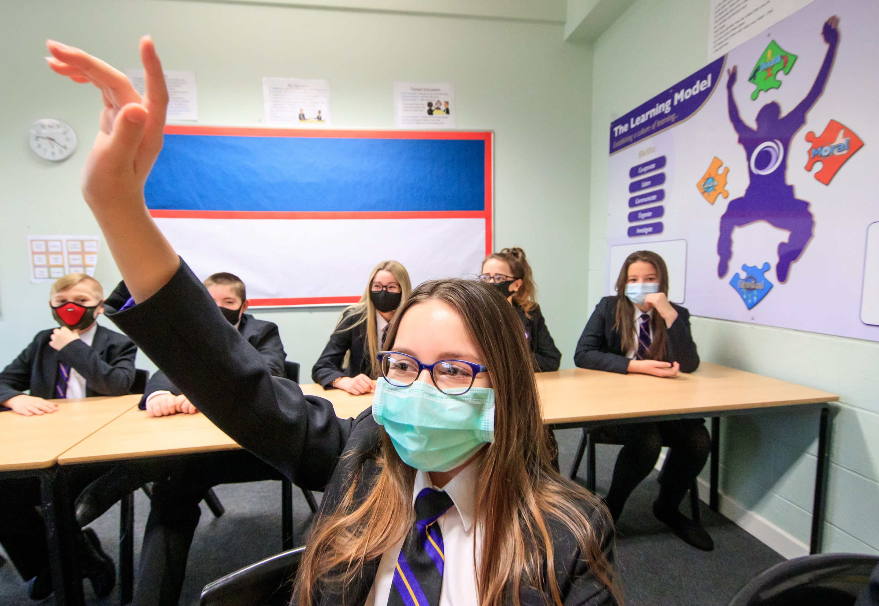 Children wearing facemasks during a lesson at Outwood Academy in Woodlands, Doncaster in Yorkshire, as pupils in England return to school for the first time in two months as part of the first stage of lockdown easing.
