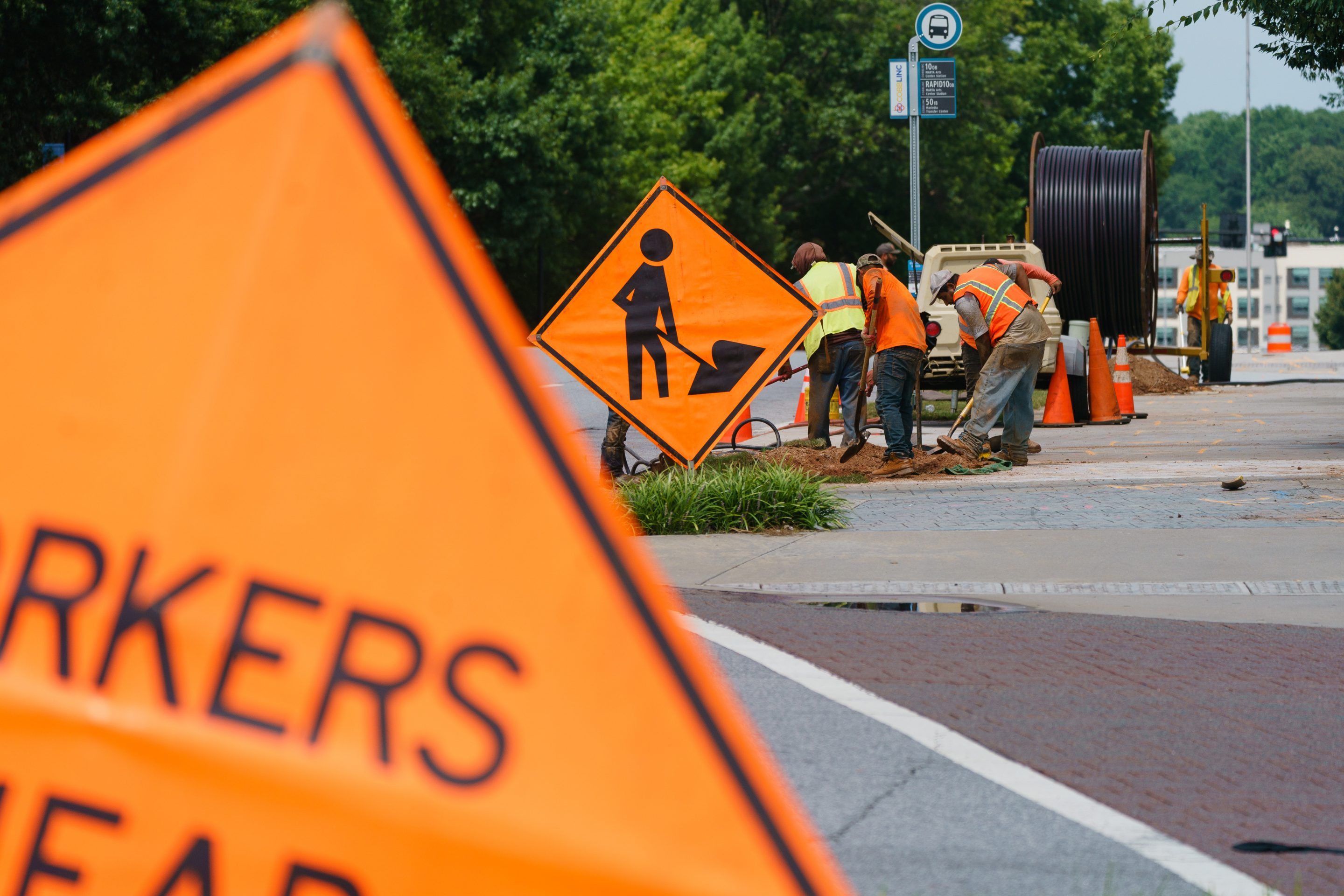 A roadwork project in Marietta, Ga. The infrastructure bill, the authors write, “is a generational opportunity to help keep the U.S. economy competitive globally, make our economic system more inclusive, and rebuild the resiliency our society needs to face future crises.”
