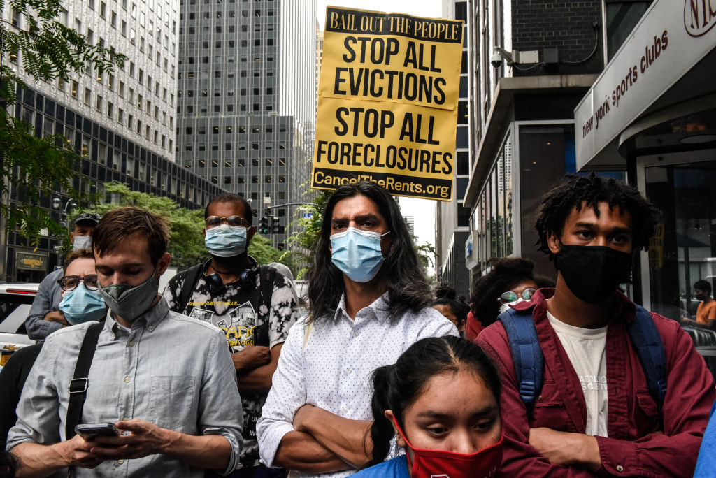 People participate in a protest against N.Y. Governor Andrew Cuomo and protest for a moratorium on evictions on August 4, 2021 in New York City. The dual issues arose after New York Attorney General Letitia James investigation concluded that Governor Cuomo did sexually harass multiple women and the eviction moratorium instated by the CDC due to the COVID-19 pandemic is slated to elapse at the end of the month.