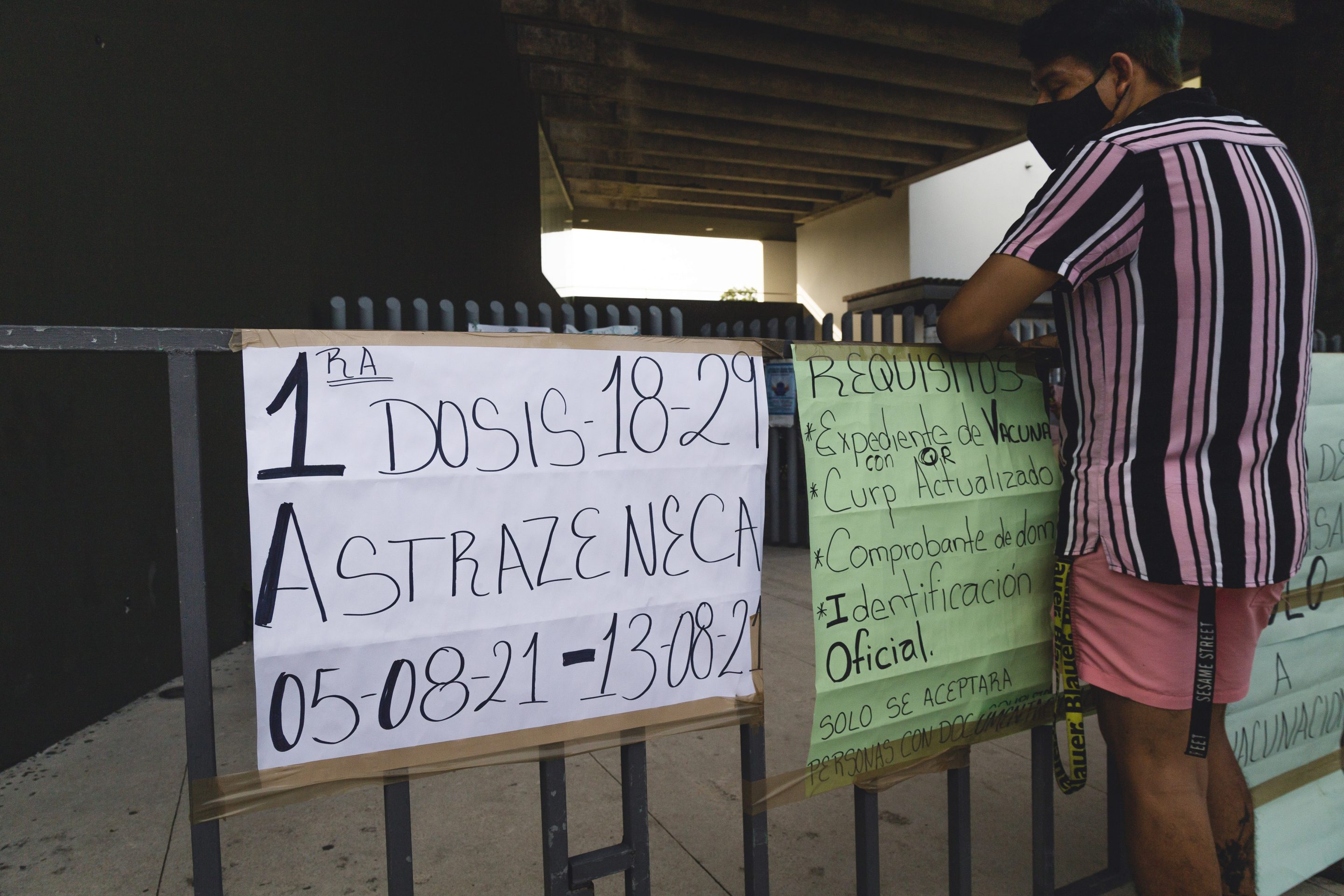 PLAYA DEL CARMEN, MEXICO - AUGUST 6, 2021: people queue to enter a vaccination center, to receive the AstraZeneca dose to reduce the spread against the Covid-19 disease, during the mass vaccination campaign for people between 18-29 years in Playa del Carmen, in the state of Quintana Roo. For the second day in a row, the vaccination points in Playa del Carmen have been saturated. On August 6, 2021 in Playa del Carmen, Mexico. (Photo credit should read Natalia Pescador / Eyepix Group/Barcroft Media via Getty Images)