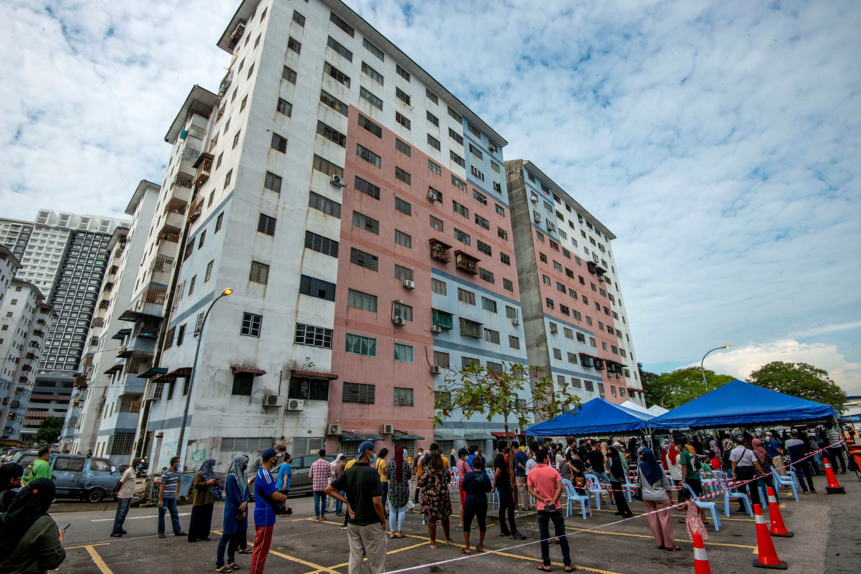 People line up to take COVID-19 tests in Subang of Selangor, Malaysia, Aug. 14, 2021.