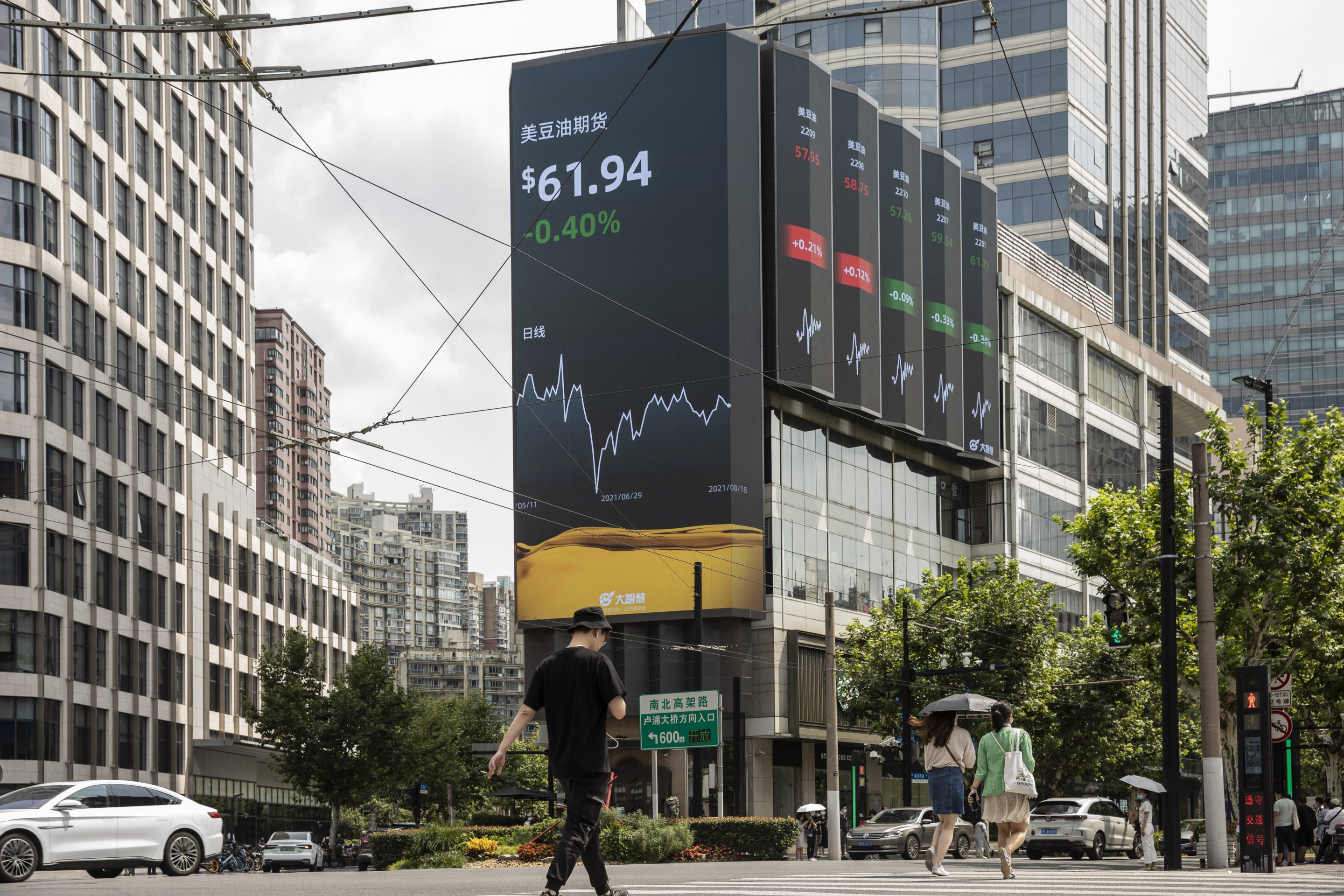 A public screen displays commodity prices in Shanghai on Aug. 18, 2021.