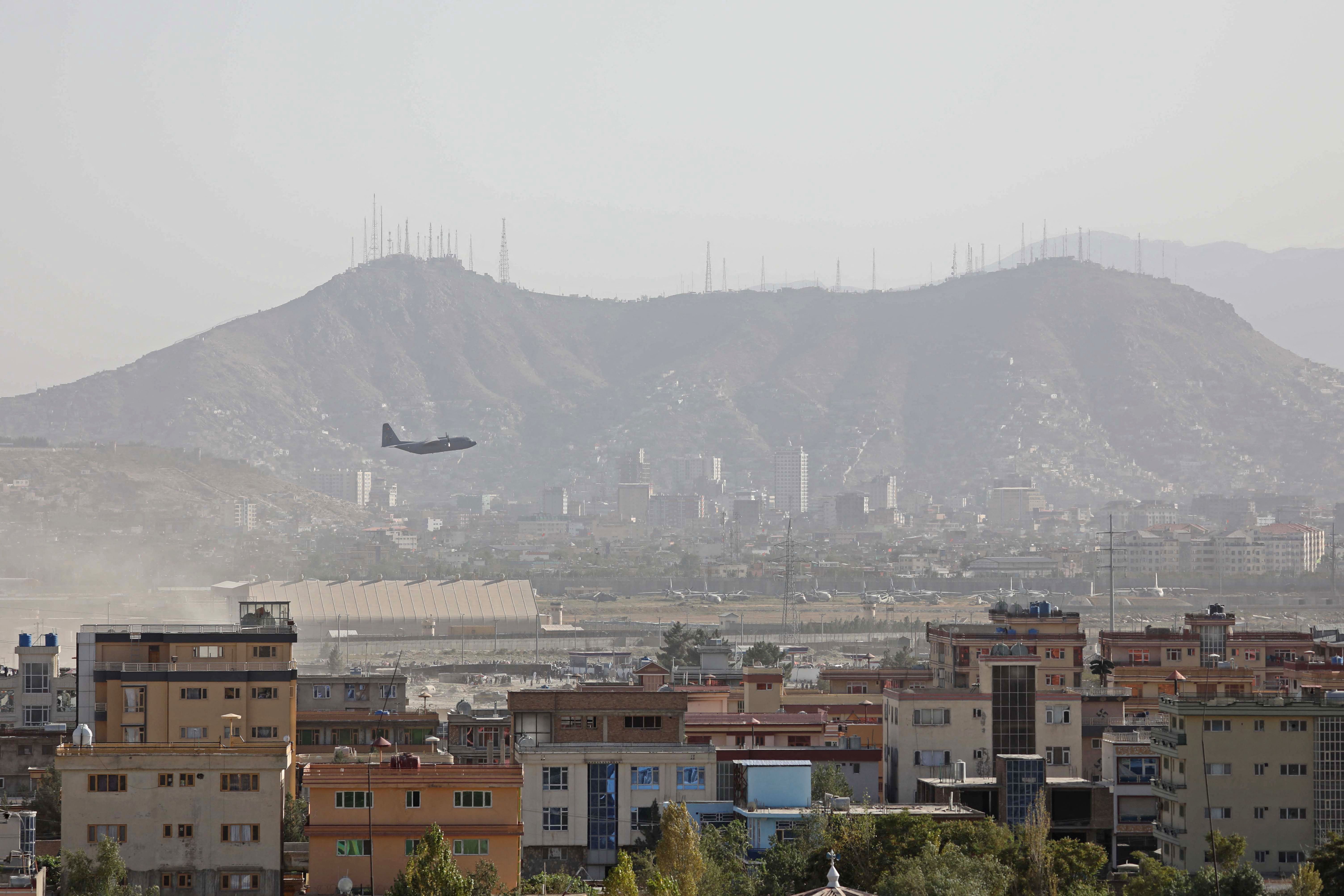 A military aircraft takes off from the military airport in Kabul on August 27, 2021.