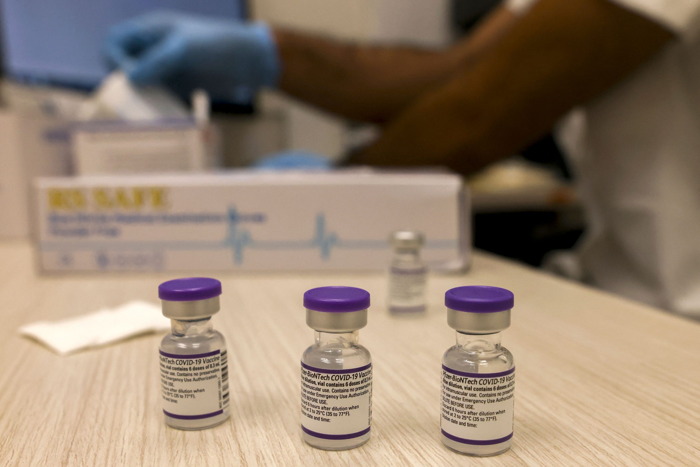 Vials of the Pfizer-BioNtech COVID-19 coronavirus vaccine lie on a table at the Clalit Health Services in the Palestinian neighbourhood of Beit Hanina, in the Israeli-annexed east Jerusalem on August 29, 2021.