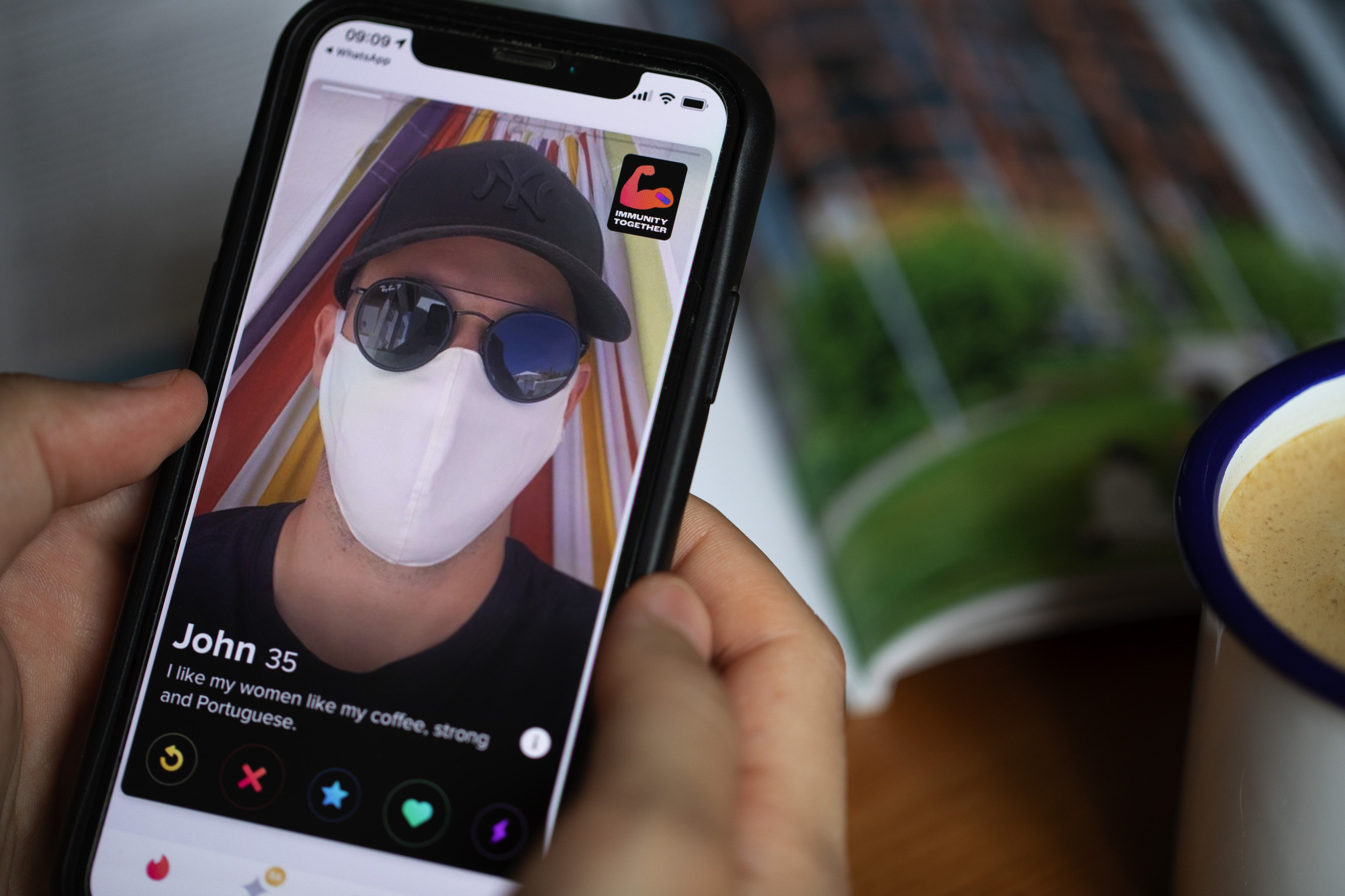 A COVID vaccine sticker is seen displayed on the photographer’s Tinder dating app profile on June 11, 2021 in London.