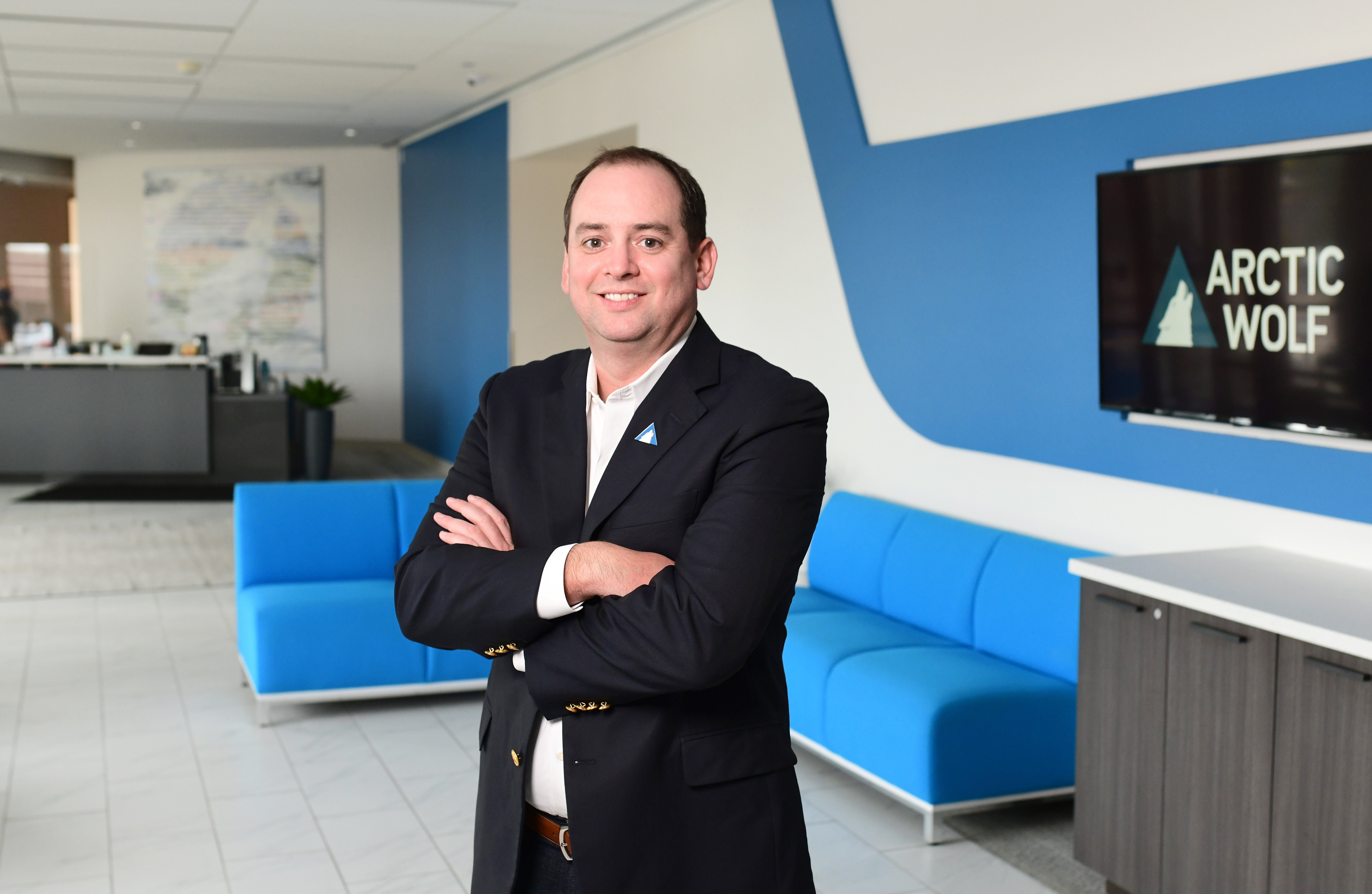 Nick Schneider is named the new chief executive officer of cybersecurity firm Arctic Wolf, which plans to go public in “three or four quarters.”
