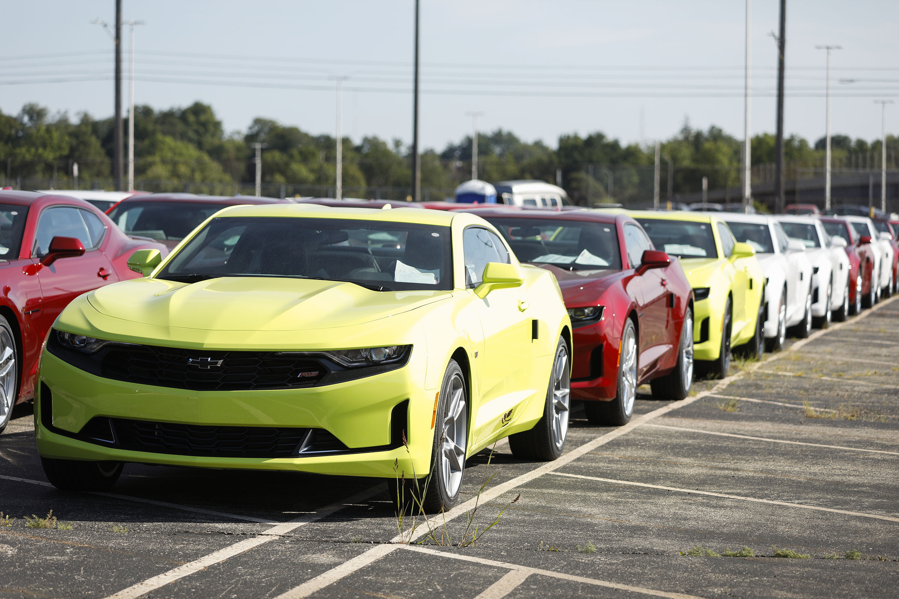  General Motors Chevy Camaros sit on a lot at the GM Lansing Grand River Assembly Plant.