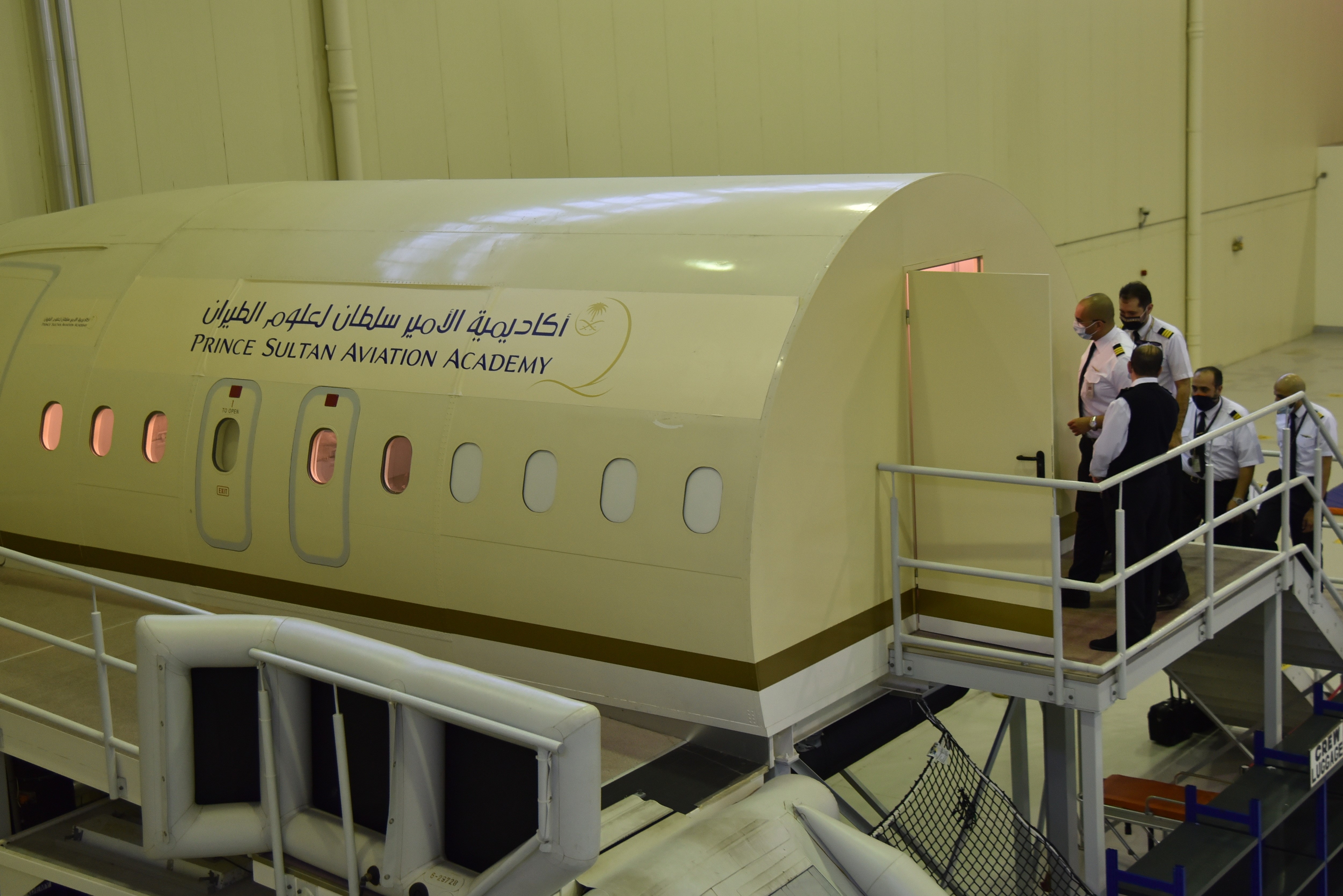 Pilots gathering inside the simulator for safety training termly in the Prince Sultan Aviation Academy in Jeddah, Saudi Arabia, on Sept. 16, 2021.