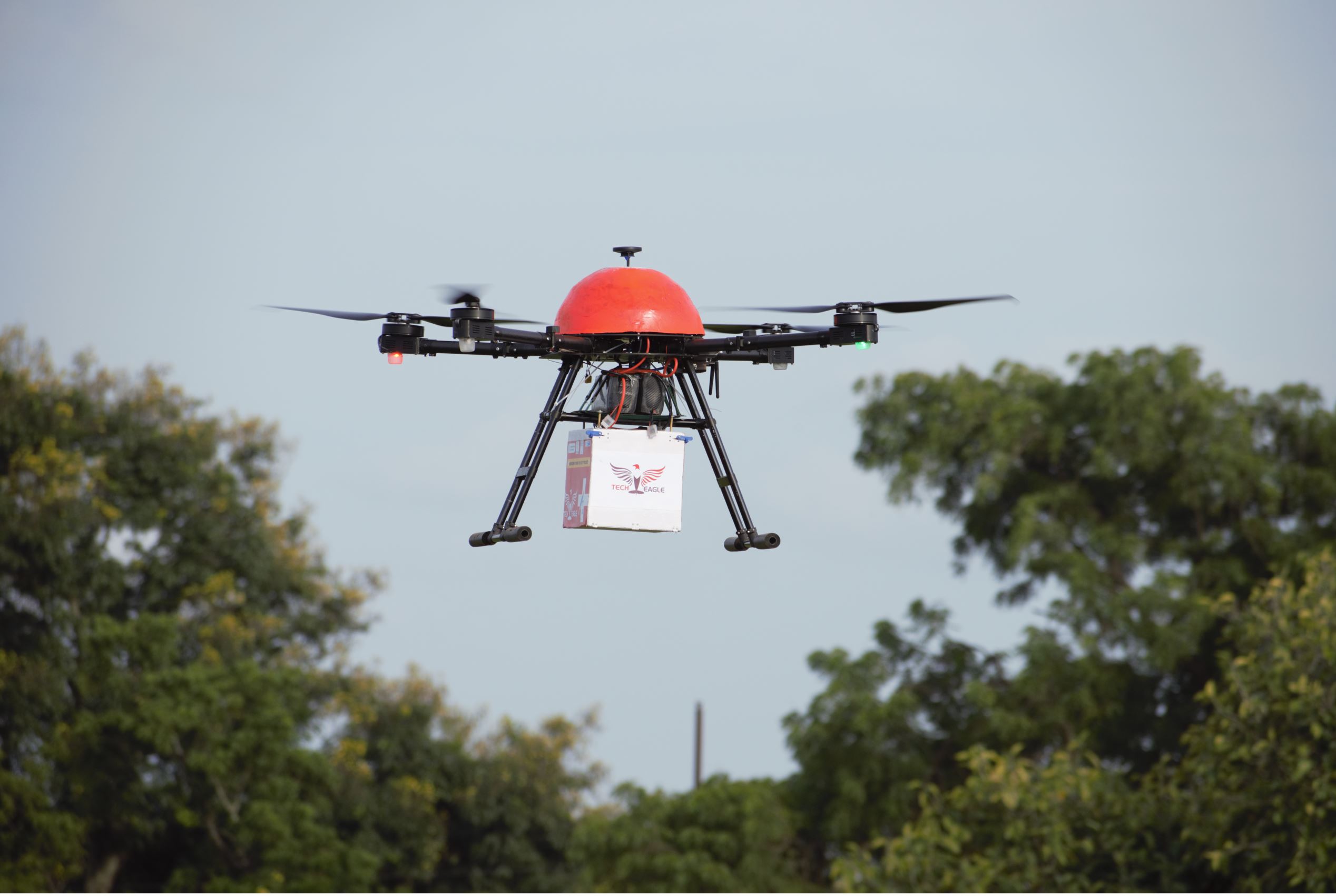 A drone made by startup firm TechEagle takes off from a parade ground in India’s southern state of Telangana carrying a box of MMR vaccines on Sept. 11, 2021.